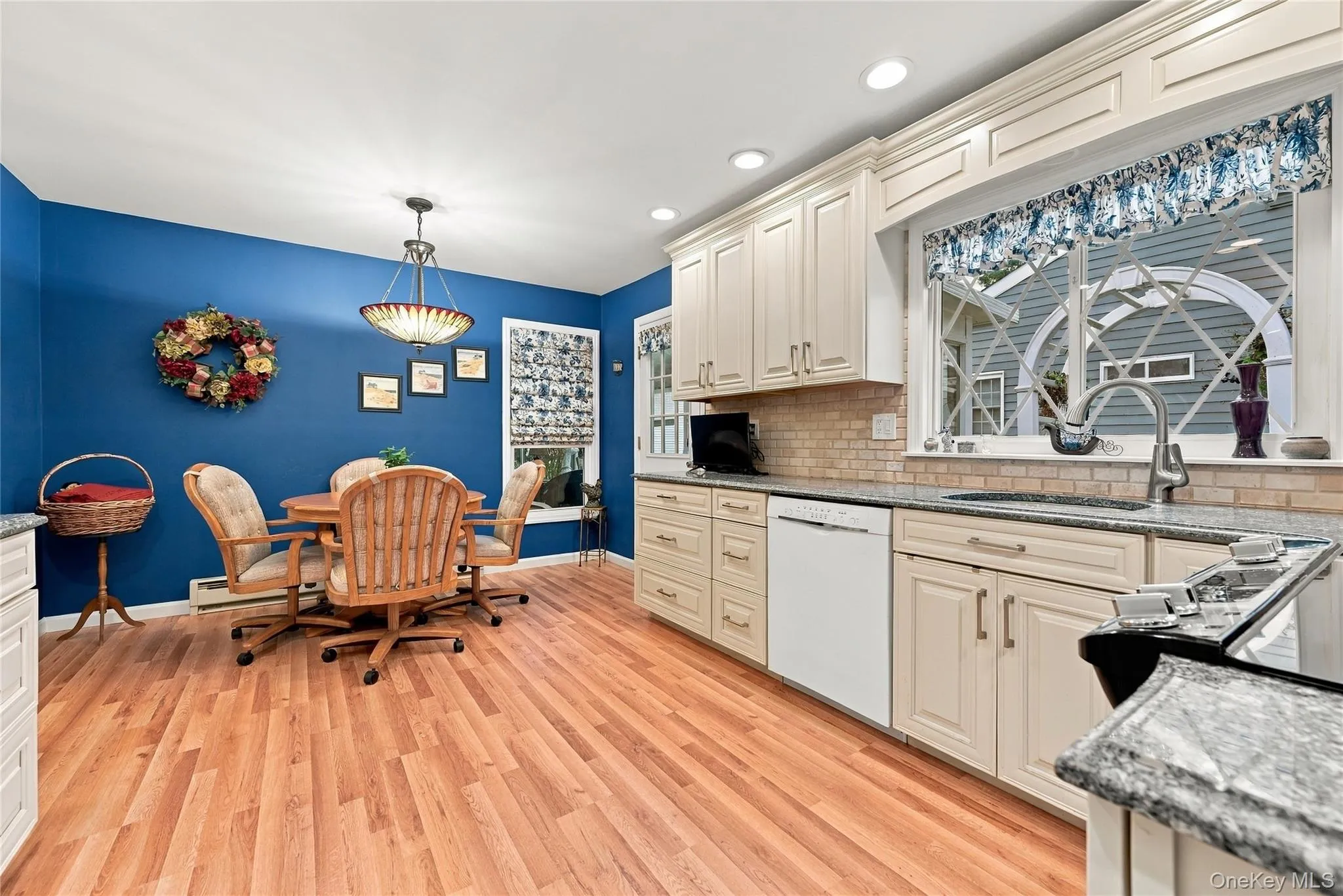 Kitchen leads you out to Sunroom and Patio for grilling. Kitchen leads you out to Sunroom and Patio for grilling.