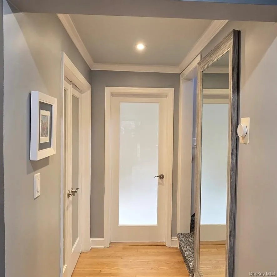 Main level - Adjoining Translucent glass Door into Master Bedroom Suite Main level - Adjoining Translucent glass Door into Master Bedroom Suite