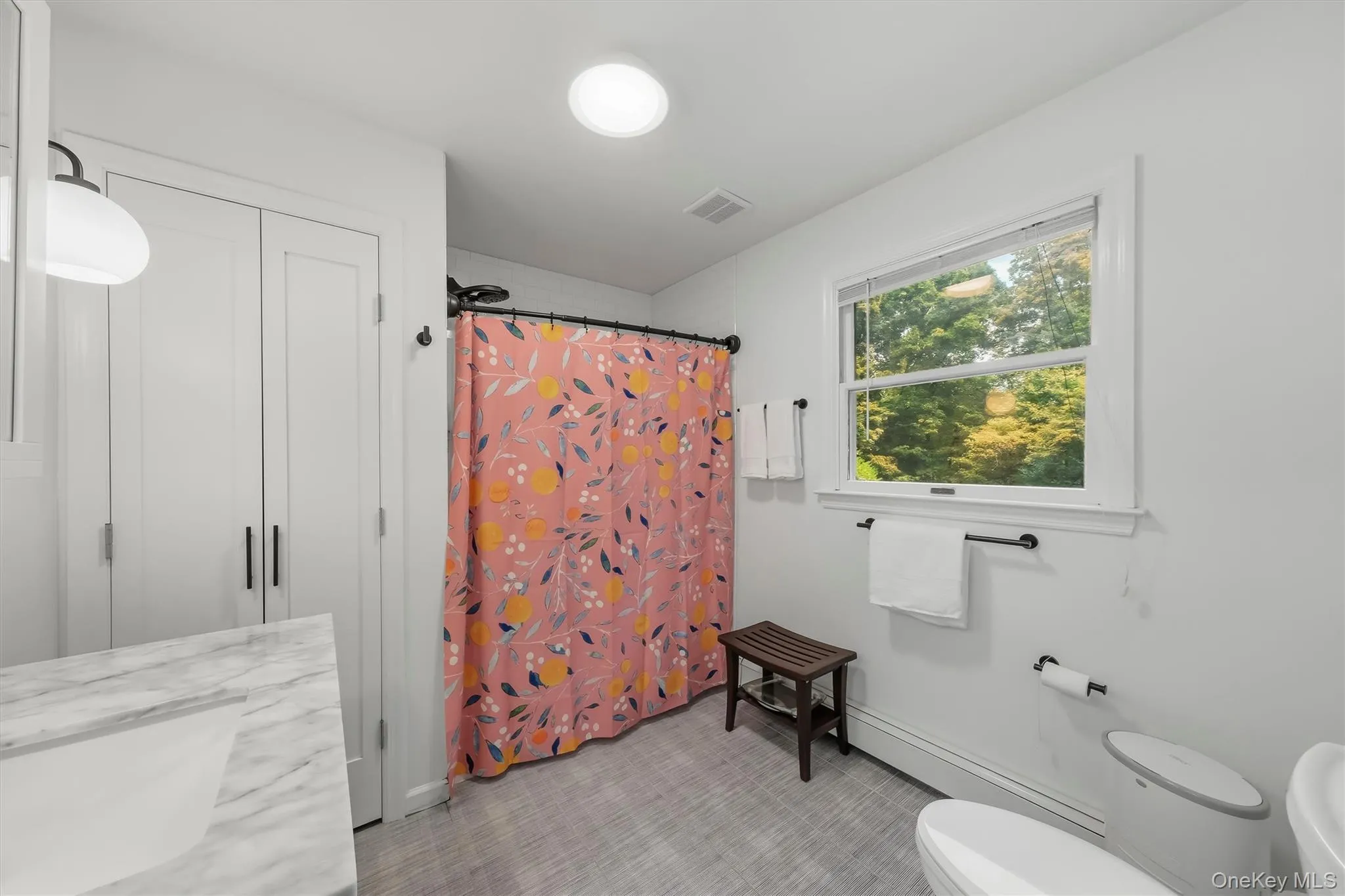 Spacious bathroom with recent renovations. Spacious bathroom with recent renovations.
