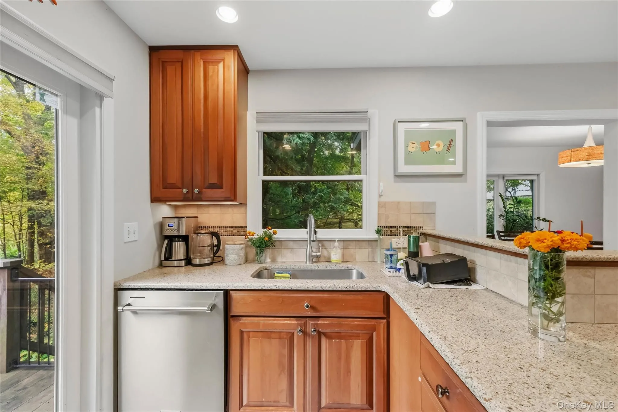 Functional kitchen space with an abundance of natural light. Functional kitchen space with an abundance of natural light.