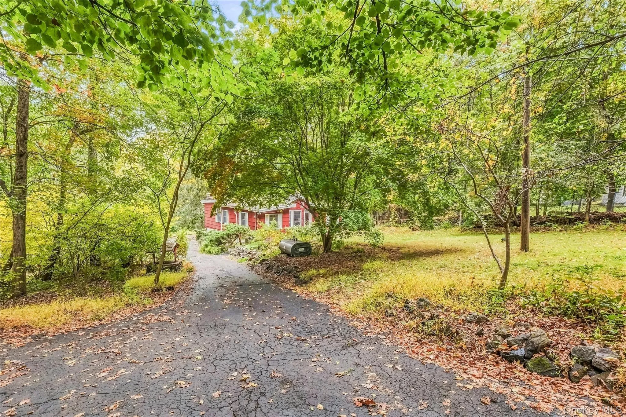 Driveway leads to property allow the front yard. Driveway leads to property allow the front yard.