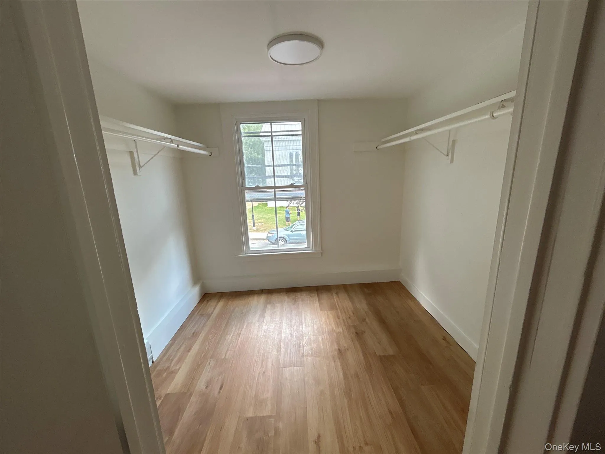Spacious walk-in closet Spacious walk-in closet