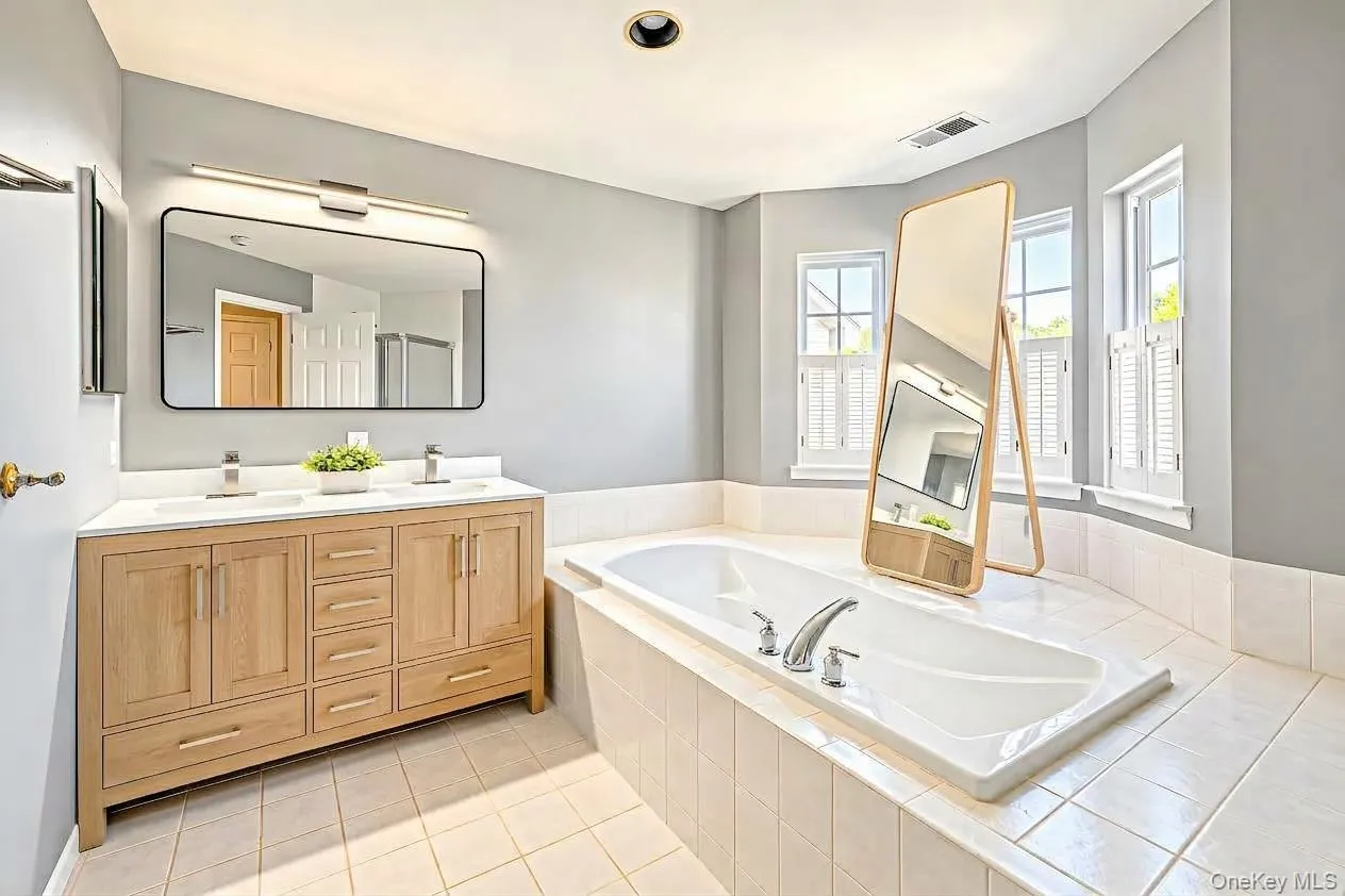 Primary bathroom with double vanity, tub and shower Primary bathroom with double vanity, tub and shower