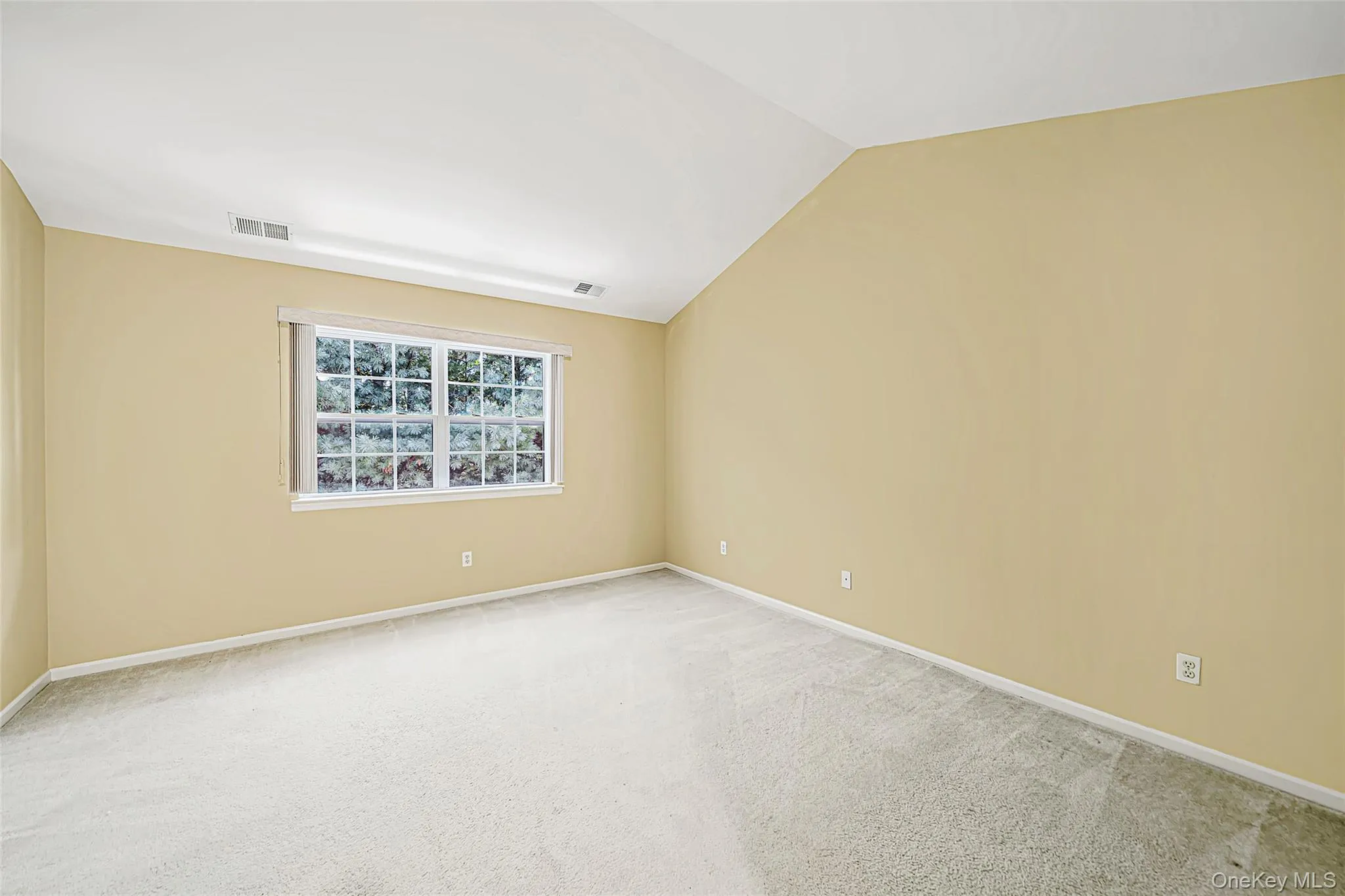 Primary bedroom with walk in closet and en-suite bathroom Primary bedroom with walk in closet and en-suite bathroom