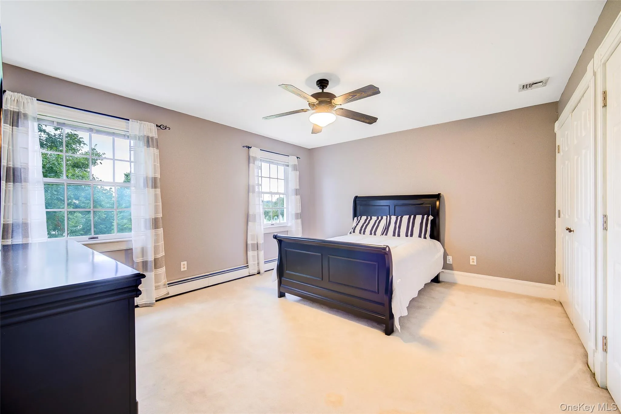 Bedroom #3 is large and has ceiling fan with integrated lighting. Carpeted with room for multiple sleeping arrangements Bedroom #3 is large and has ceiling fan with integrated lighting. Carpeted with room for multiple sleeping arrangements