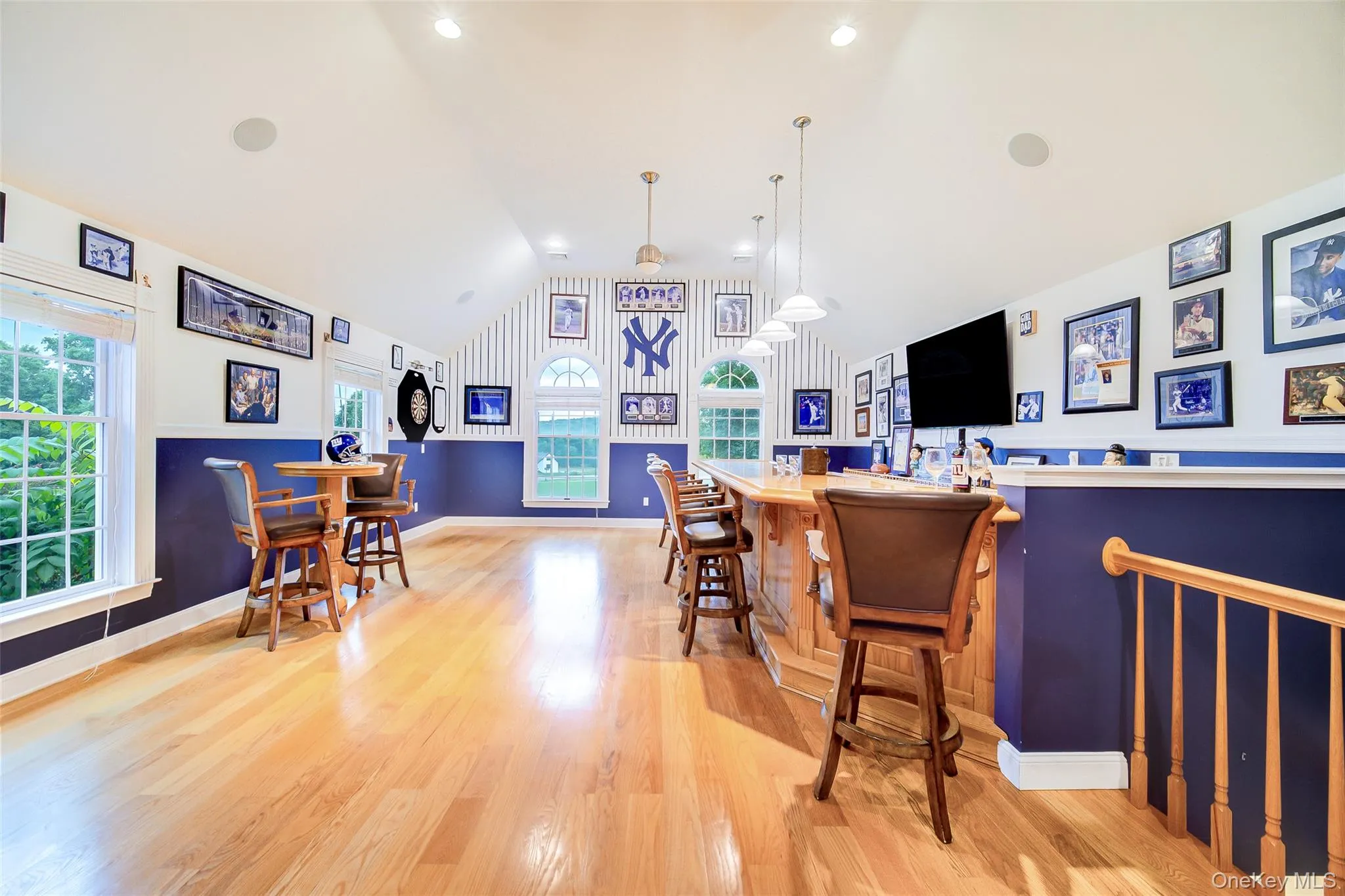 Bonus room has recessed lighting, hardwood floors, multiple windows, a door to the side yard and a full bath in the space Bonus room has recessed lighting, hardwood floors, multiple windows, a door to the side yard and a full bath in the space