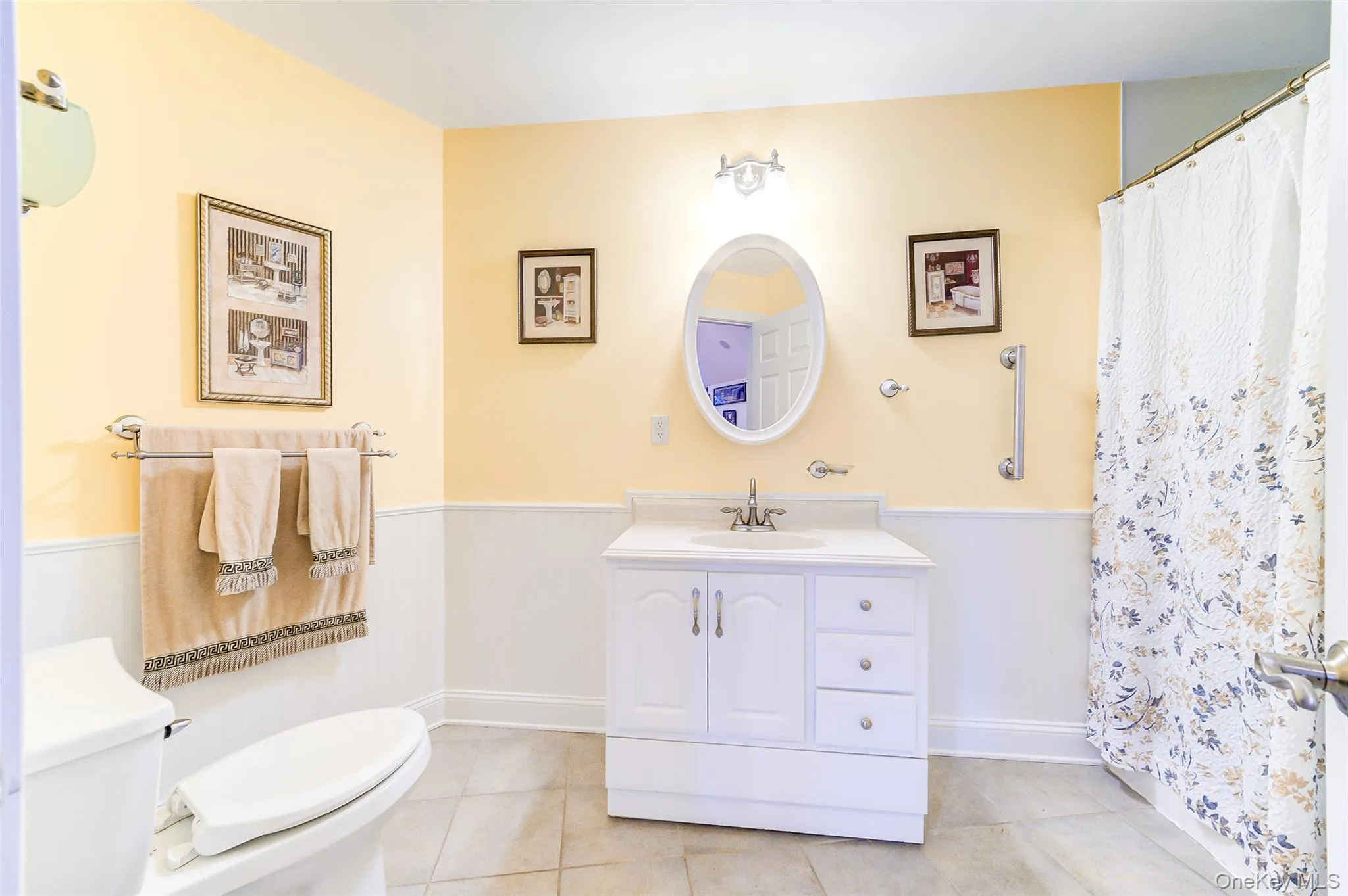 Full bathroom, just off of Bonus Room features a white stone topped vanity,. full tub/shower and tiled flooring Full bathroom, just off of Bonus Room features a white stone topped vanity,. full tub/shower and tiled flooring