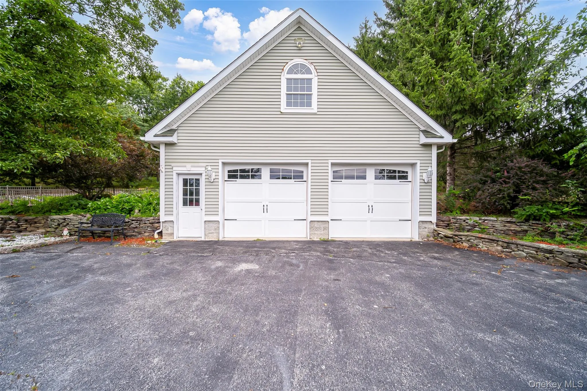 Two-car heated garage with finished upper level. Perfect for Home based business, storage, extra guest space (with some work) or a workshop. Two-car heated garage with finished upper level. Perfect for Home based business, storage, extra guest space (with some work) or a workshop.