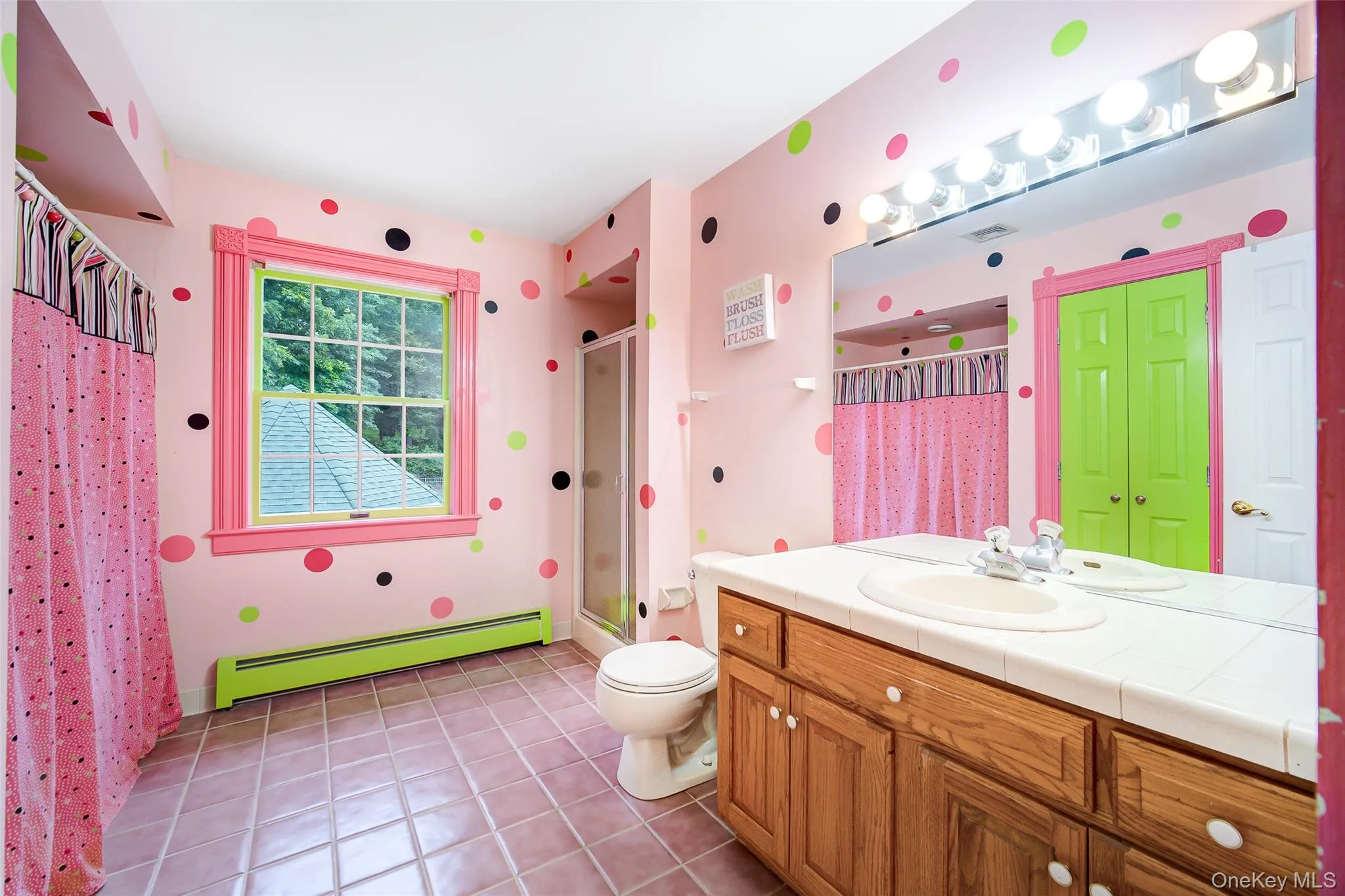2nd floor playfully designed full bath has separate tub/shower combo and stand up shower unit. 2nd floor playfully designed full bath has separate tub/shower combo and stand up shower unit.