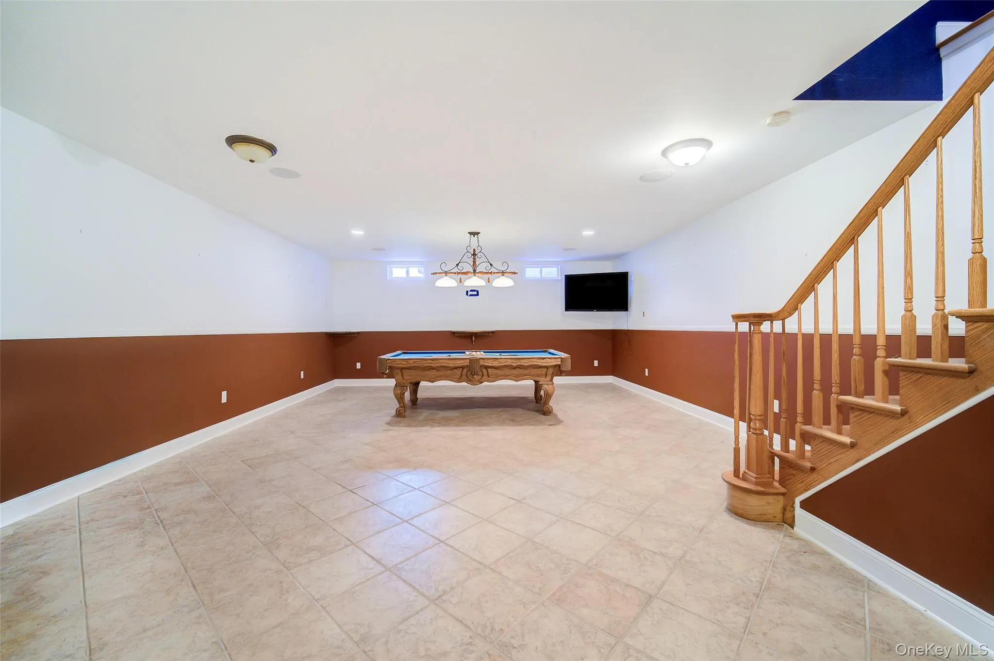 Spacious room featuring radiant heated tile floor, recessed lighting and a sound system. Spacious room featuring radiant heated tile floor, recessed lighting and a sound system.
