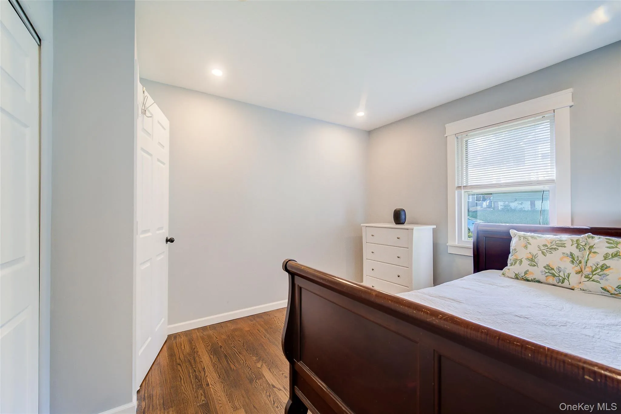Hardwood-finish flooring, recessed lighting, and a window for natural light Hardwood-finish flooring, recessed lighting, and a window for natural light