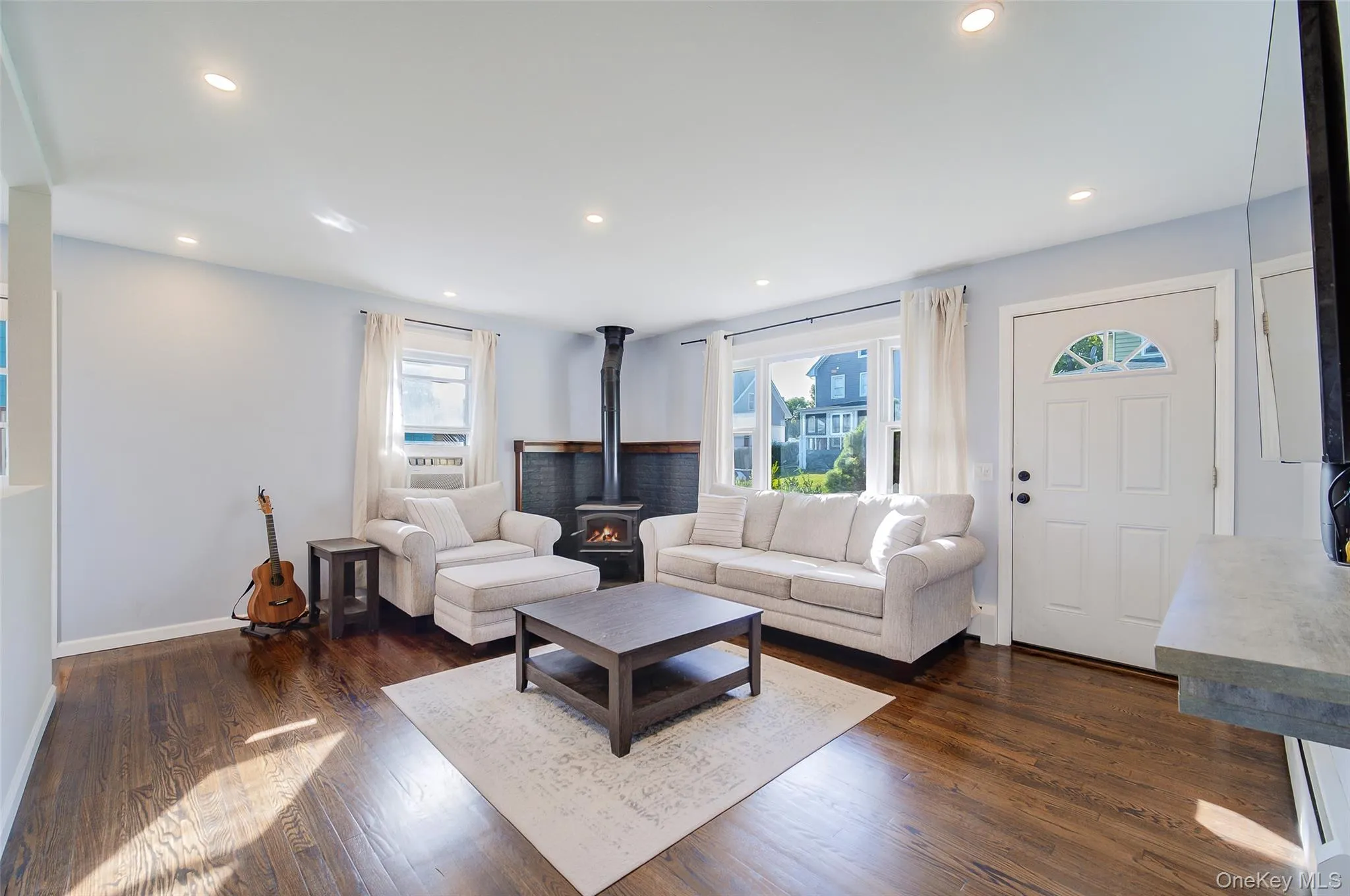 Hardwood flooring and recessed lighting throughout main level. Wood burning stove and solar panels make for low utility bills Hardwood flooring and recessed lighting throughout main level. Wood burning stove and solar panels make for low utility bills