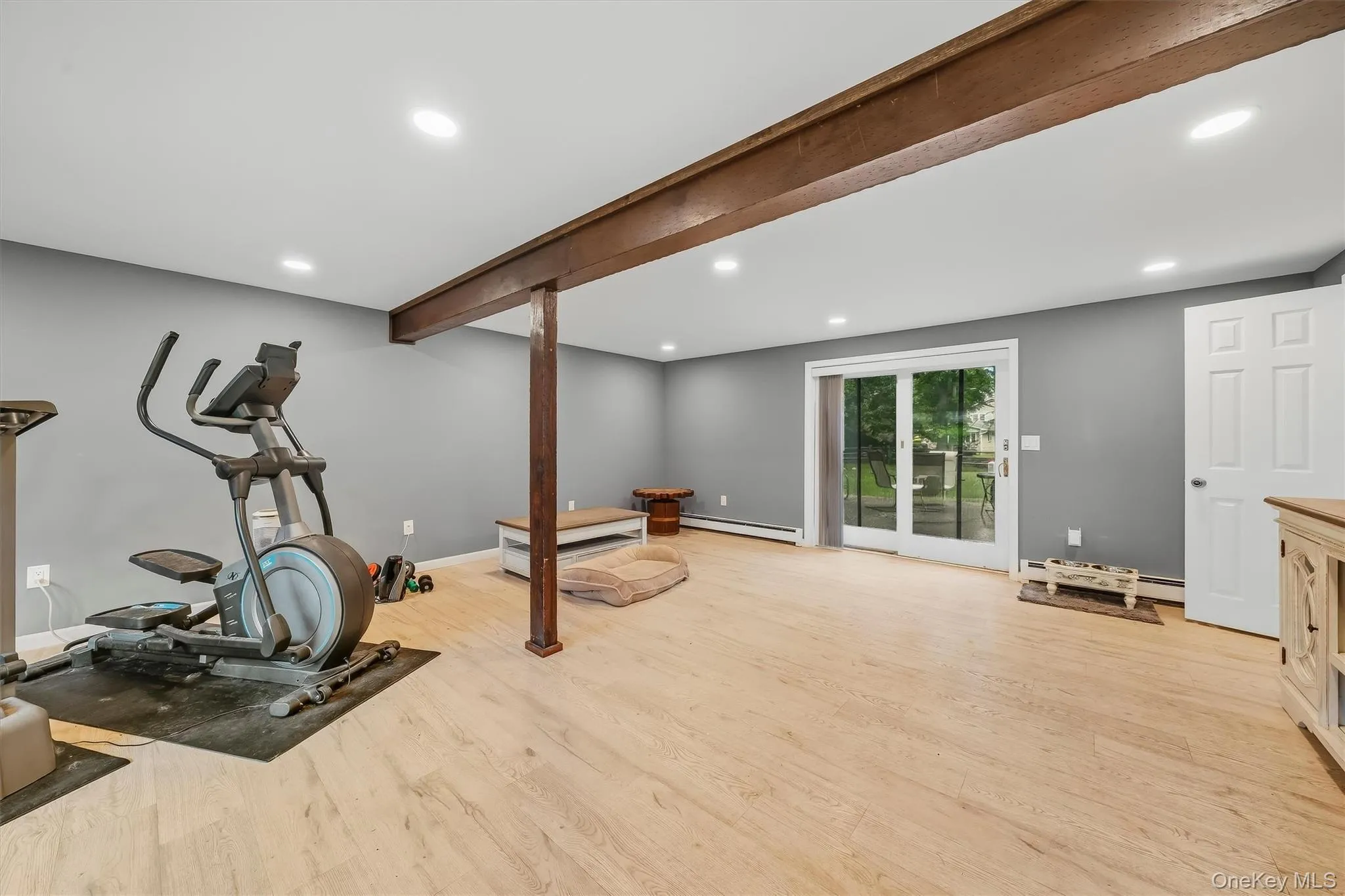 Recessed lighting and light wood-finish flooring complement the neutral wall tones Recessed lighting and light wood-finish flooring complement the neutral wall tones
