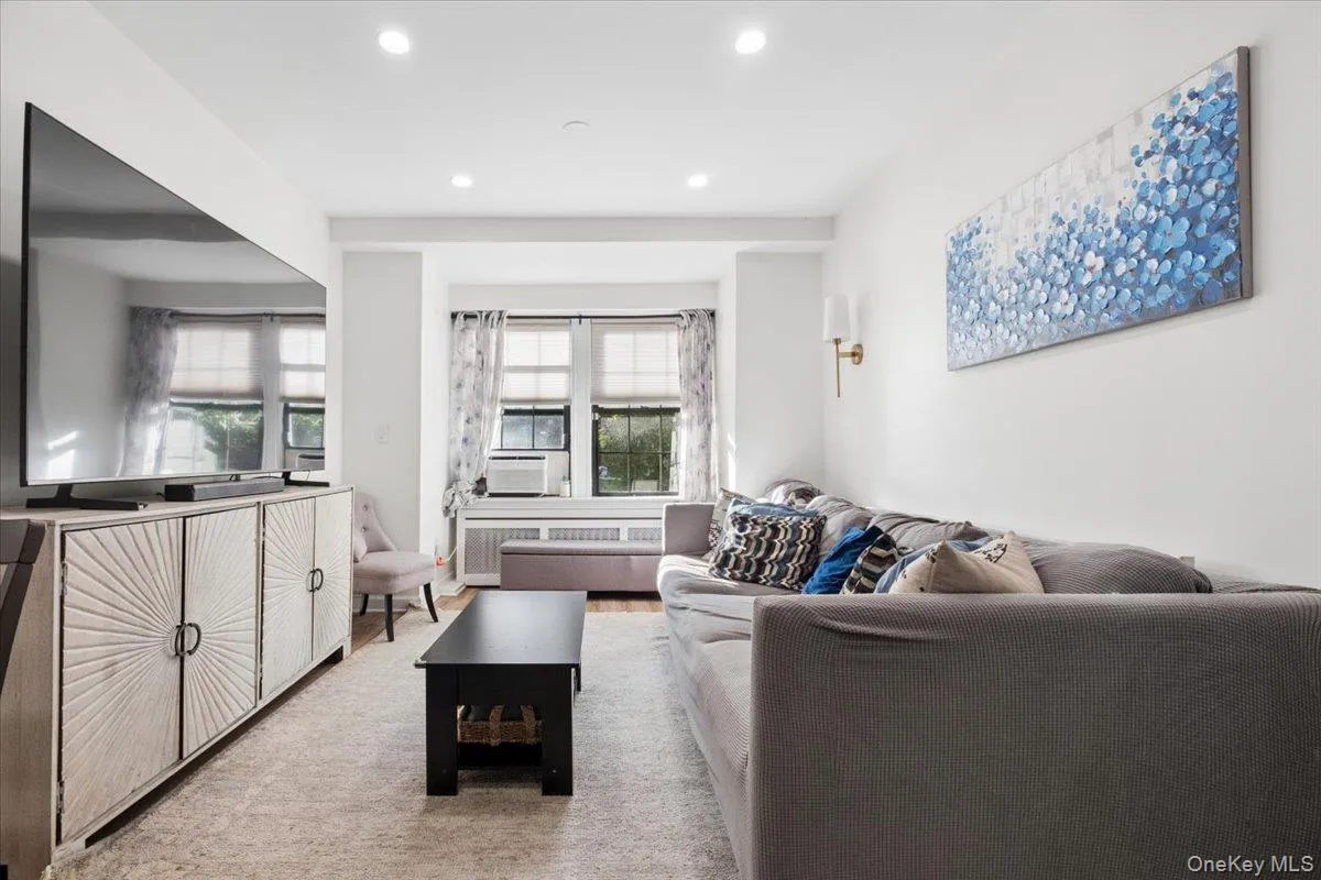 Large living room provides plenty of space for comfortable seating area Large living room provides plenty of space for comfortable seating area