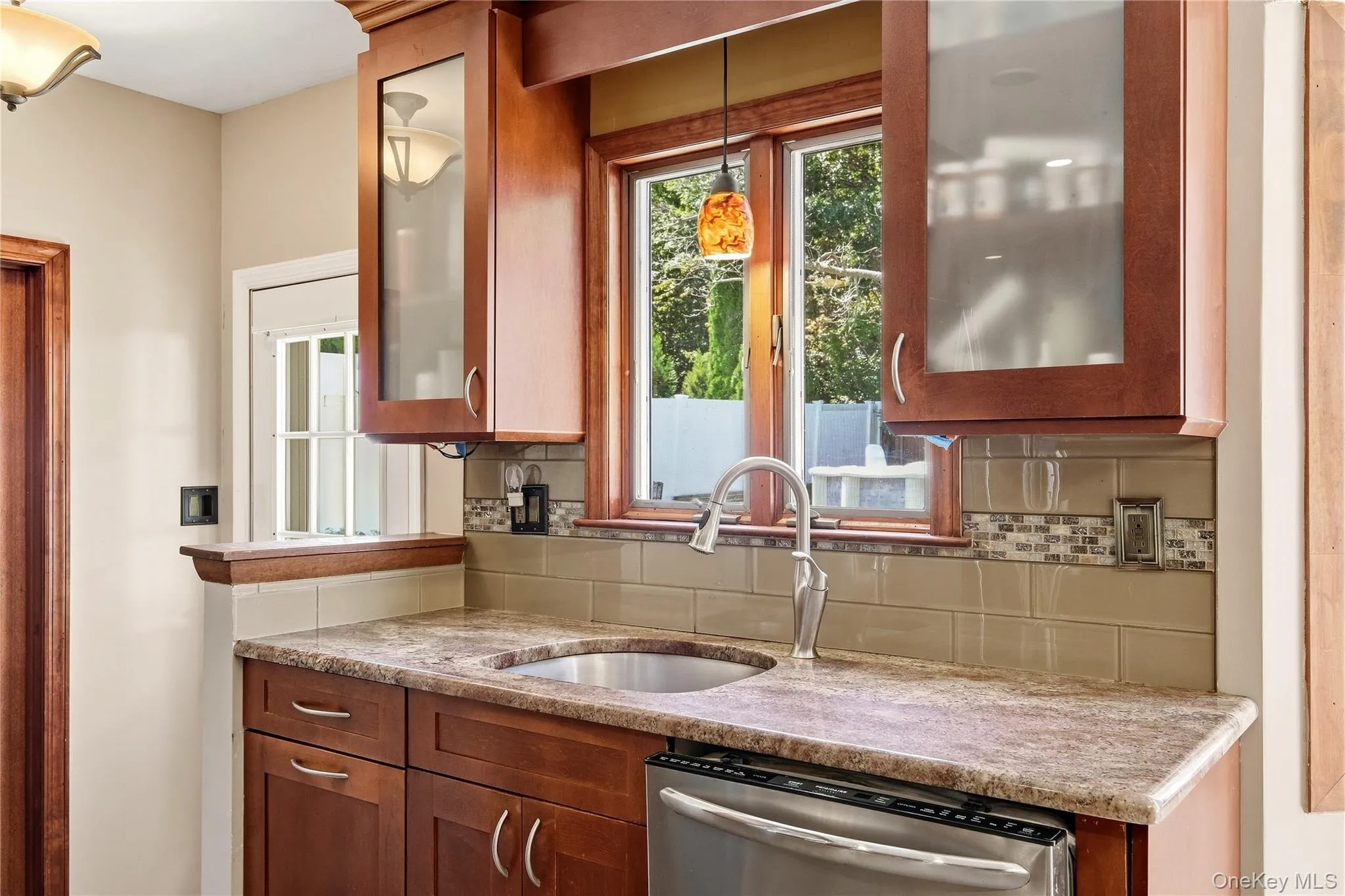 Separate dishwashing space with view of pantry Separate dishwashing space with view of pantry