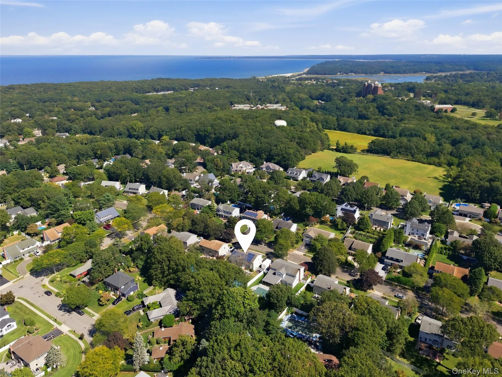 Residential area with mature tree coverage, bordering the Long Island Sound Residential area with mature tree coverage, bordering the Long Island Sound