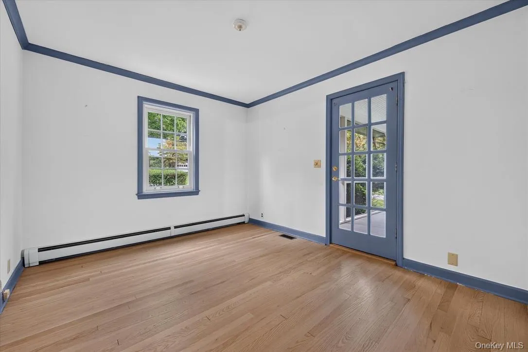 First floor bedroom with access to screened in porch First floor bedroom with access to screened in porch