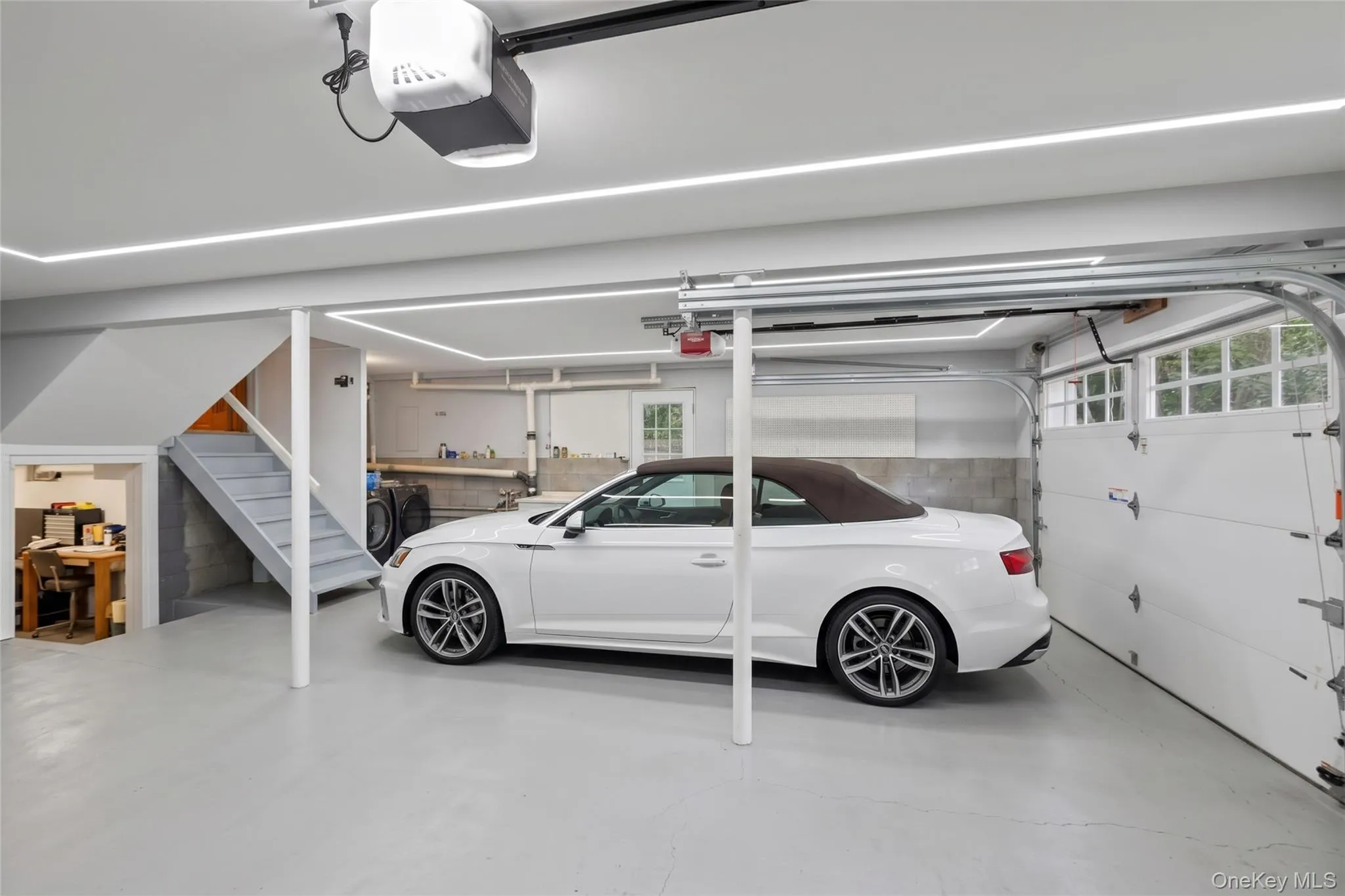 spacious 2 car garage. Garage is Ai newly painted, with additional lighting from Ai spacious 2 car garage. Garage is Ai newly painted, with additional lighting from Ai