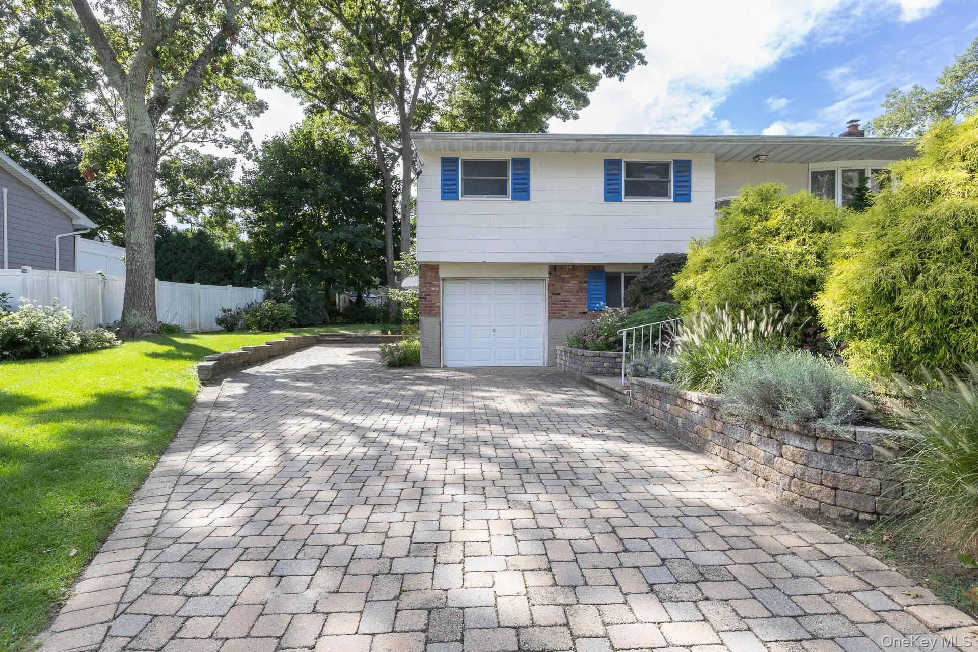 Paver Driveway with Room for Multiple Vehicles Paver Driveway with Room for Multiple Vehicles