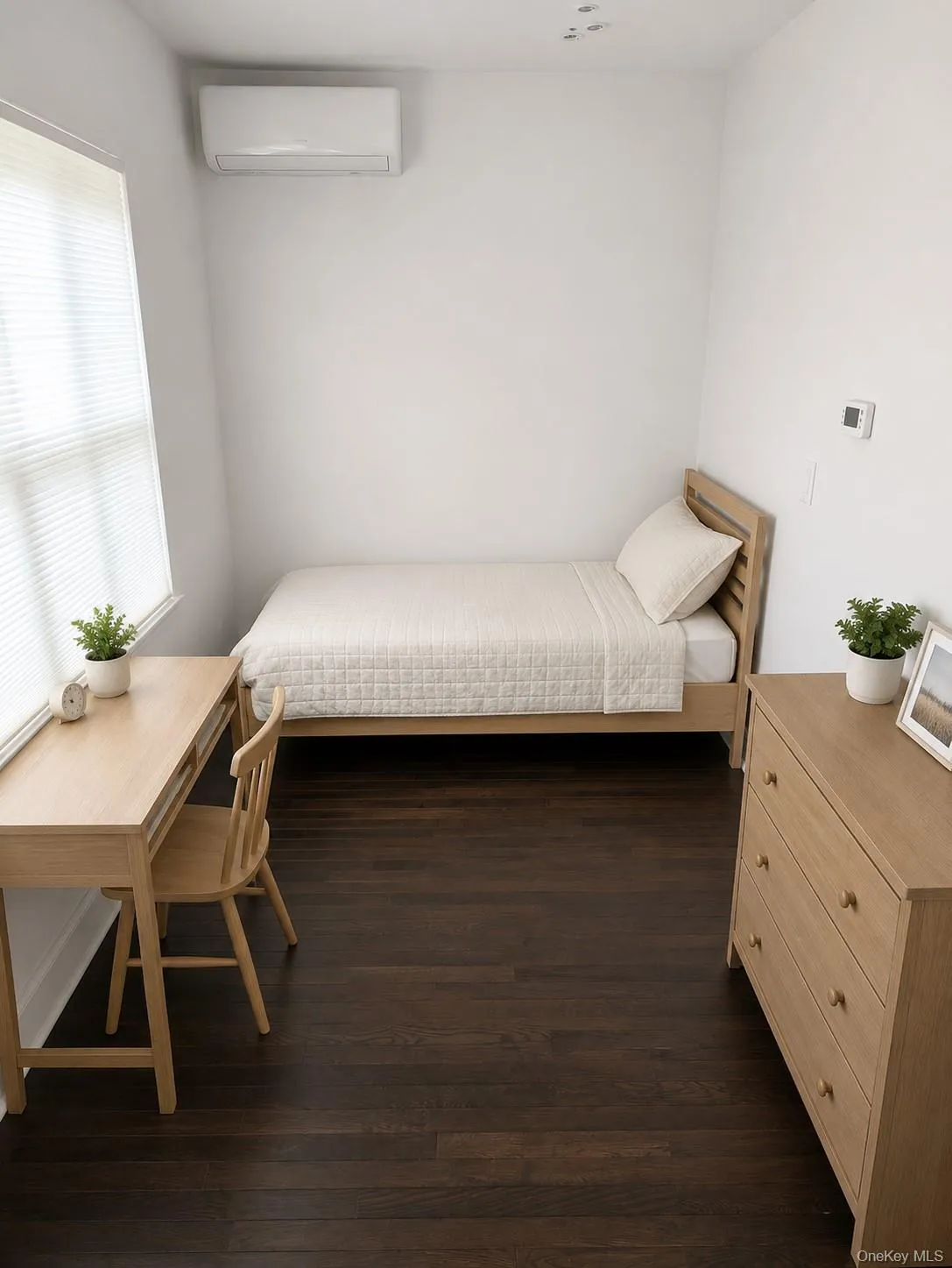 Dark wood-finish flooring, white walls, mini-split air conditioning unit, window with blinds, and recessed ceiling lighting Dark wood-finish flooring, white walls, mini-split air conditioning unit, window with blinds, and recessed ceiling lighting
