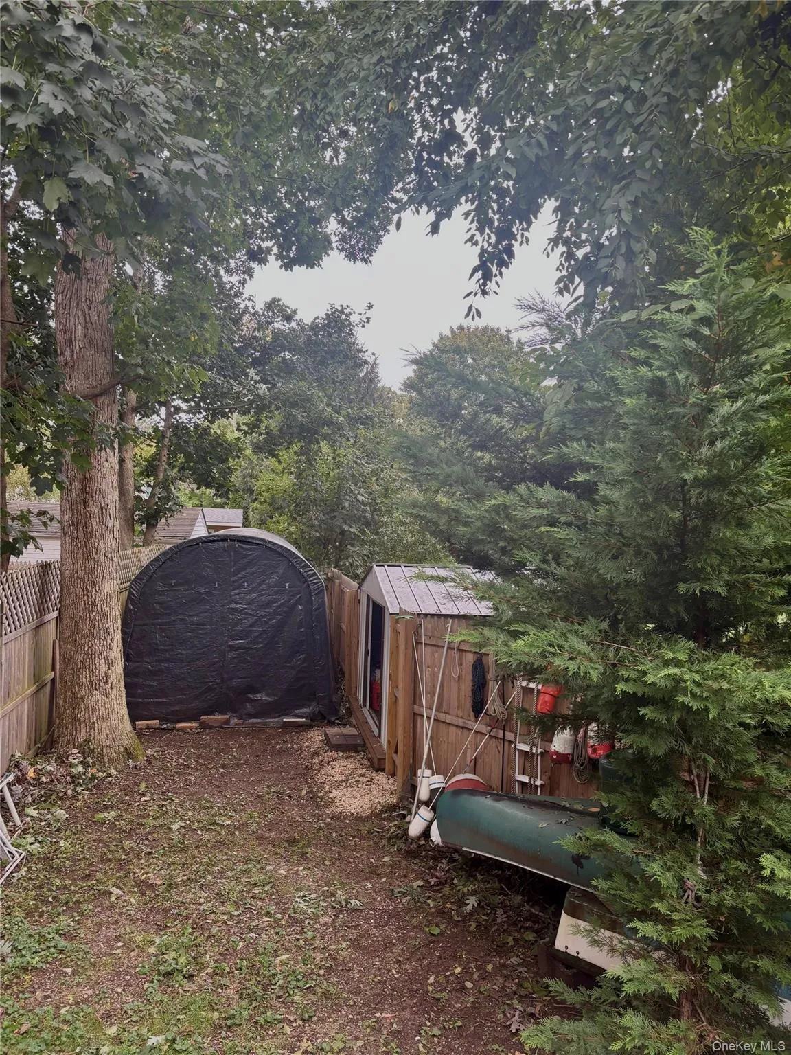 Carport for your toys or extra Storage on an extra strip of land that is included Carport for your toys or extra Storage on an extra strip of land that is included