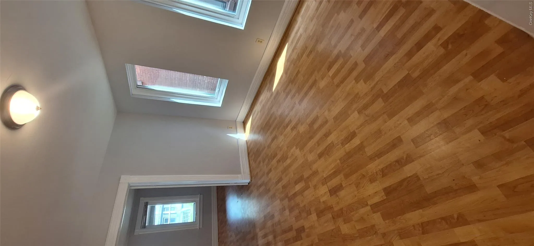 Large Living room with light wood laminate flooring Large Living room with light wood laminate flooring