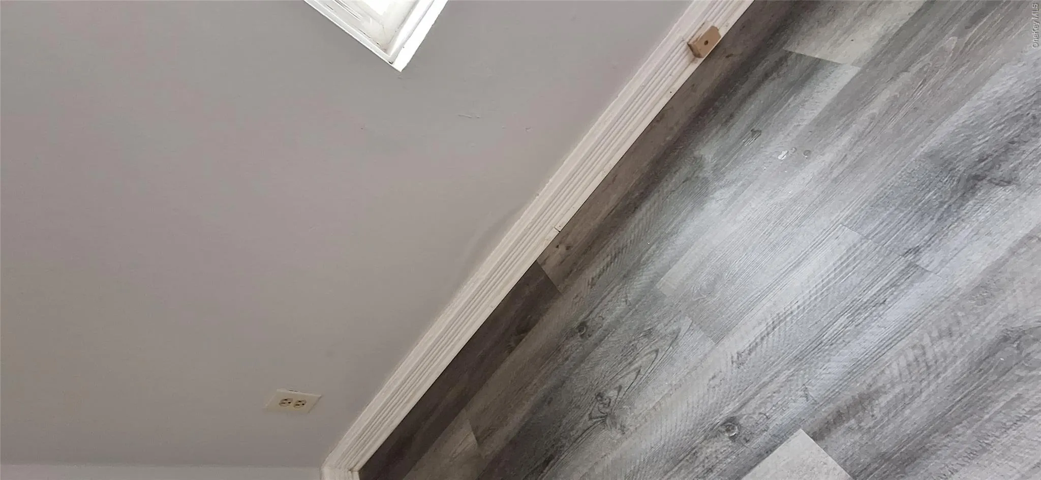 Details with wood finished floors and baseboards Details with wood finished floors and baseboards