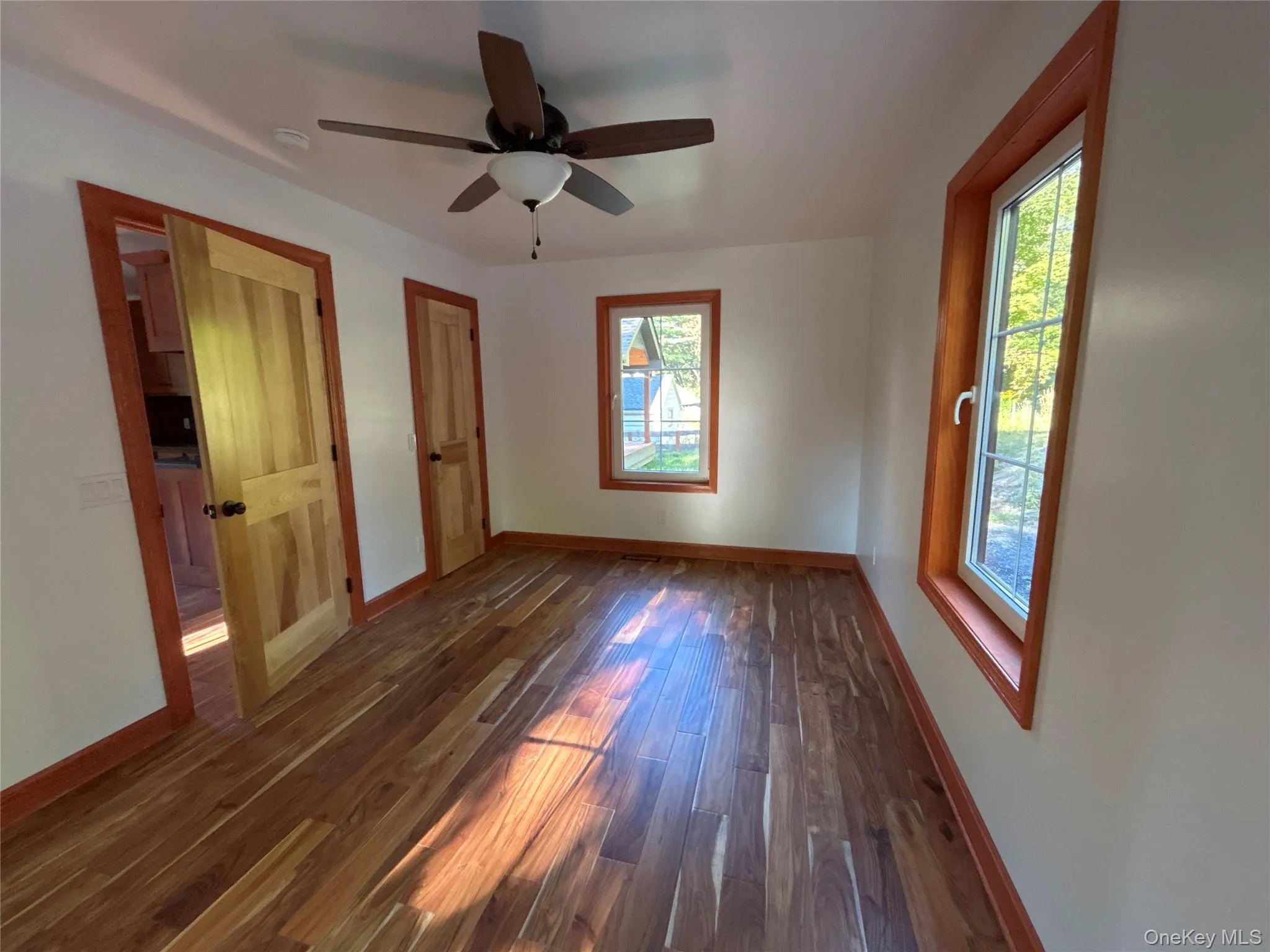 Cozy bedroom with wood floorss Cozy bedroom with wood floorss