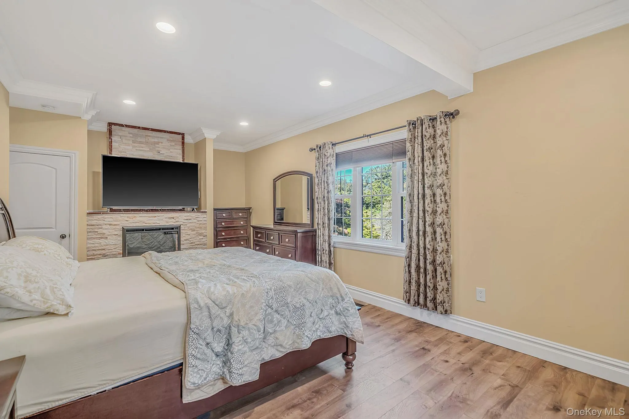En Suite One (bdrm 3) with electric fireplace, walk-in closet and bath En Suite One (bdrm 3) with electric fireplace, walk-in closet and bath