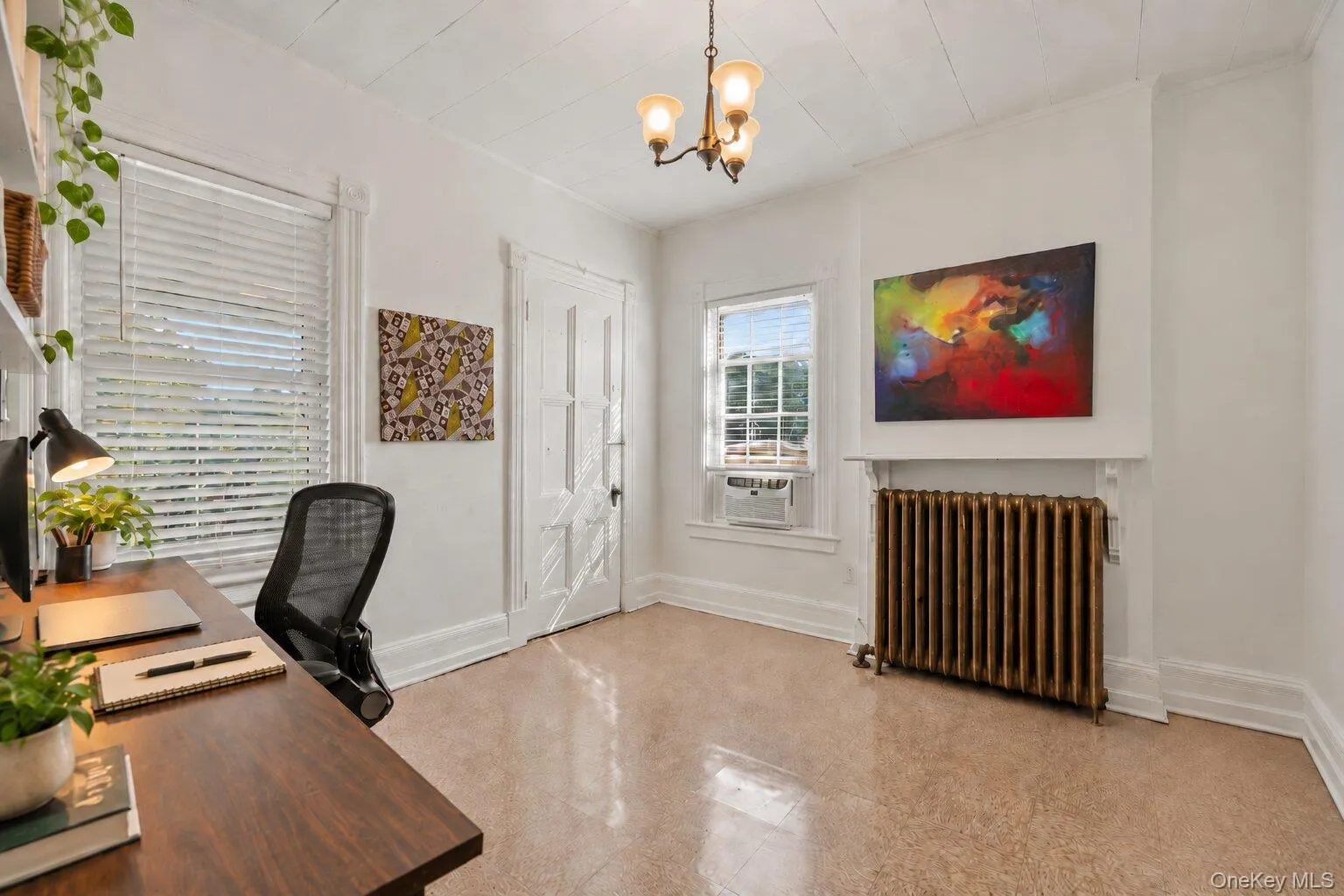Virtually Staged Furniture. Alternate view of the flexible room featuring windows, radiator, decorative ceiling fixture, and natural light. Virtually Staged Furniture. Alternate view of the flexible room featuring windows, radiator, decorative ceiling fixture, and natural light.