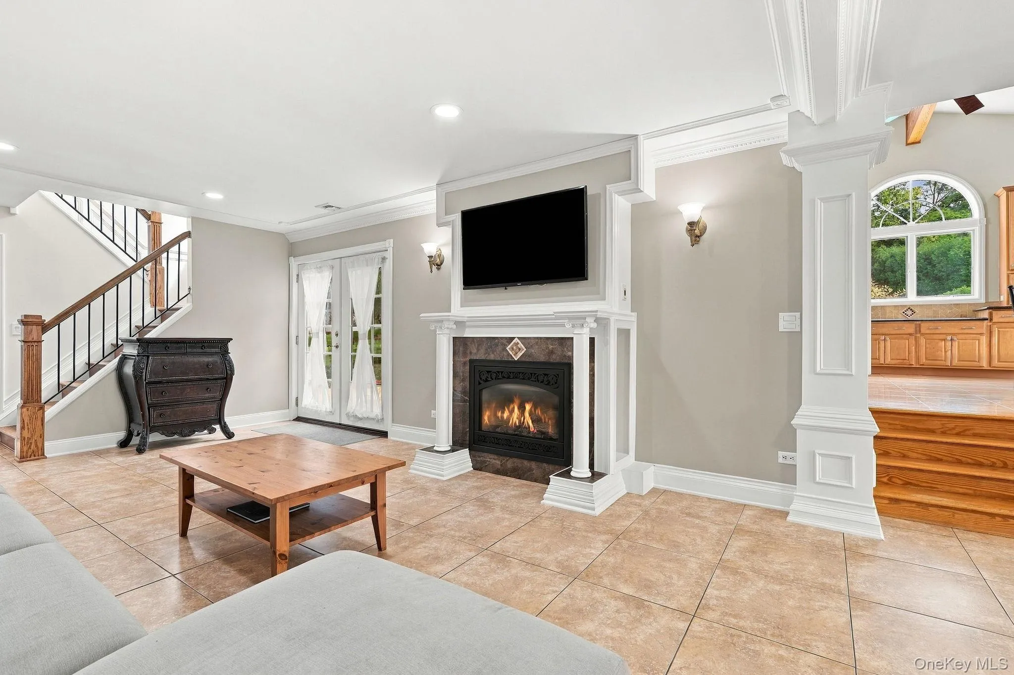A welcoming family room centered around a handsome gas fireplace. A welcoming family room centered around a handsome gas fireplace.