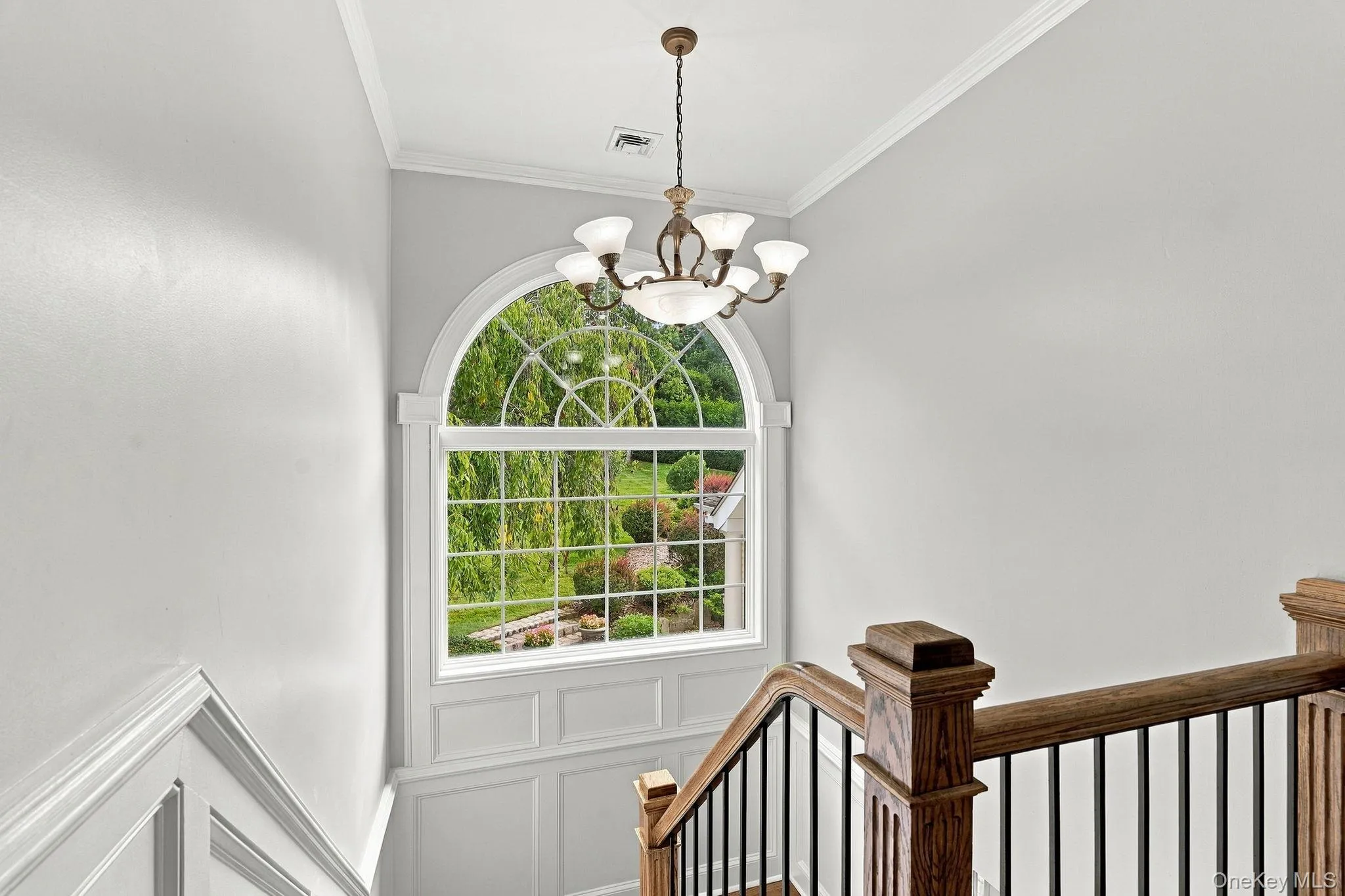 Signature arched windows bring natural light deep into the interiors. Signature arched windows bring natural light deep into the interiors.