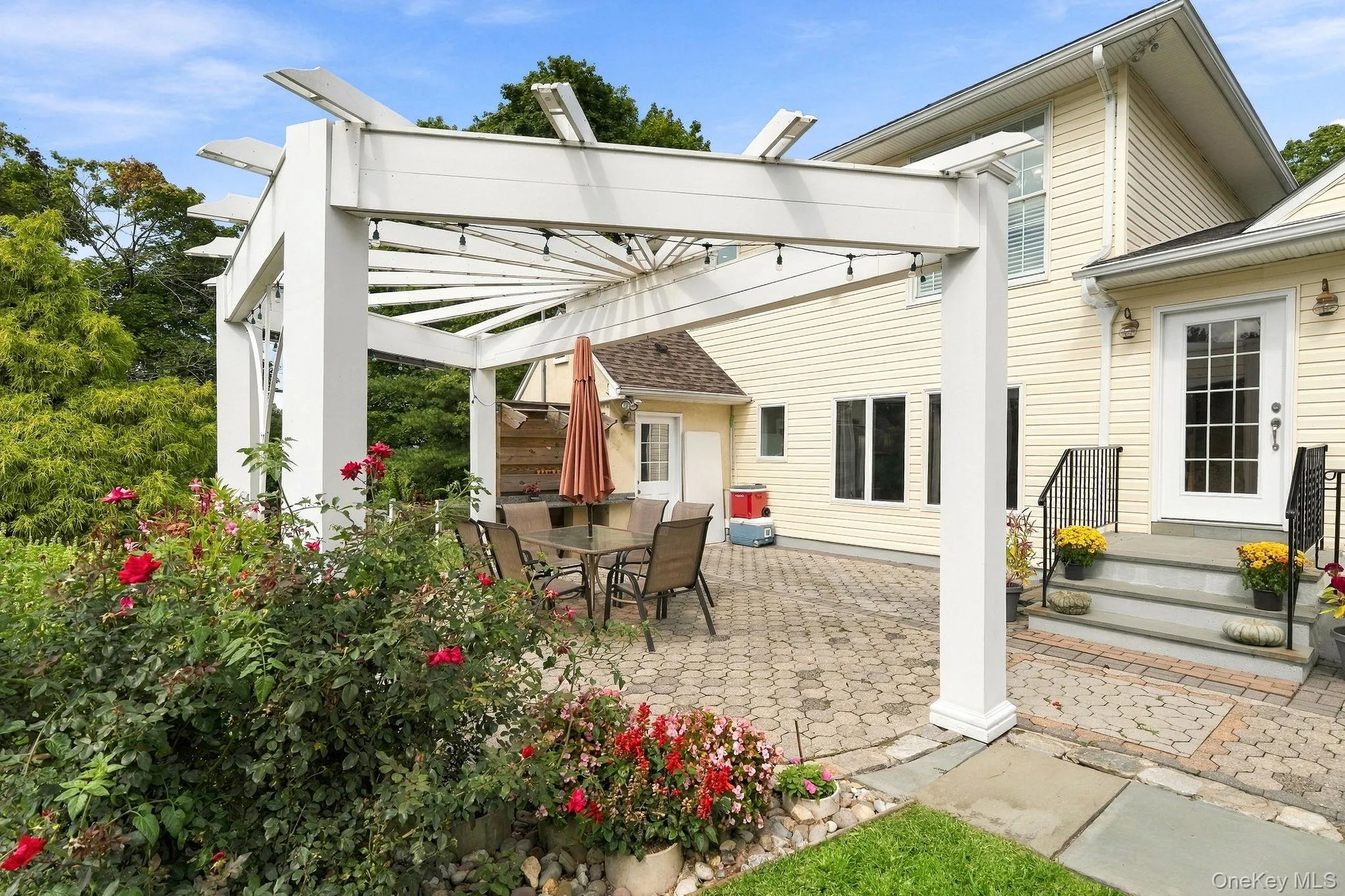 An inviting destination for al fresco dining and relaxed evenings. An inviting destination for al fresco dining and relaxed evenings.