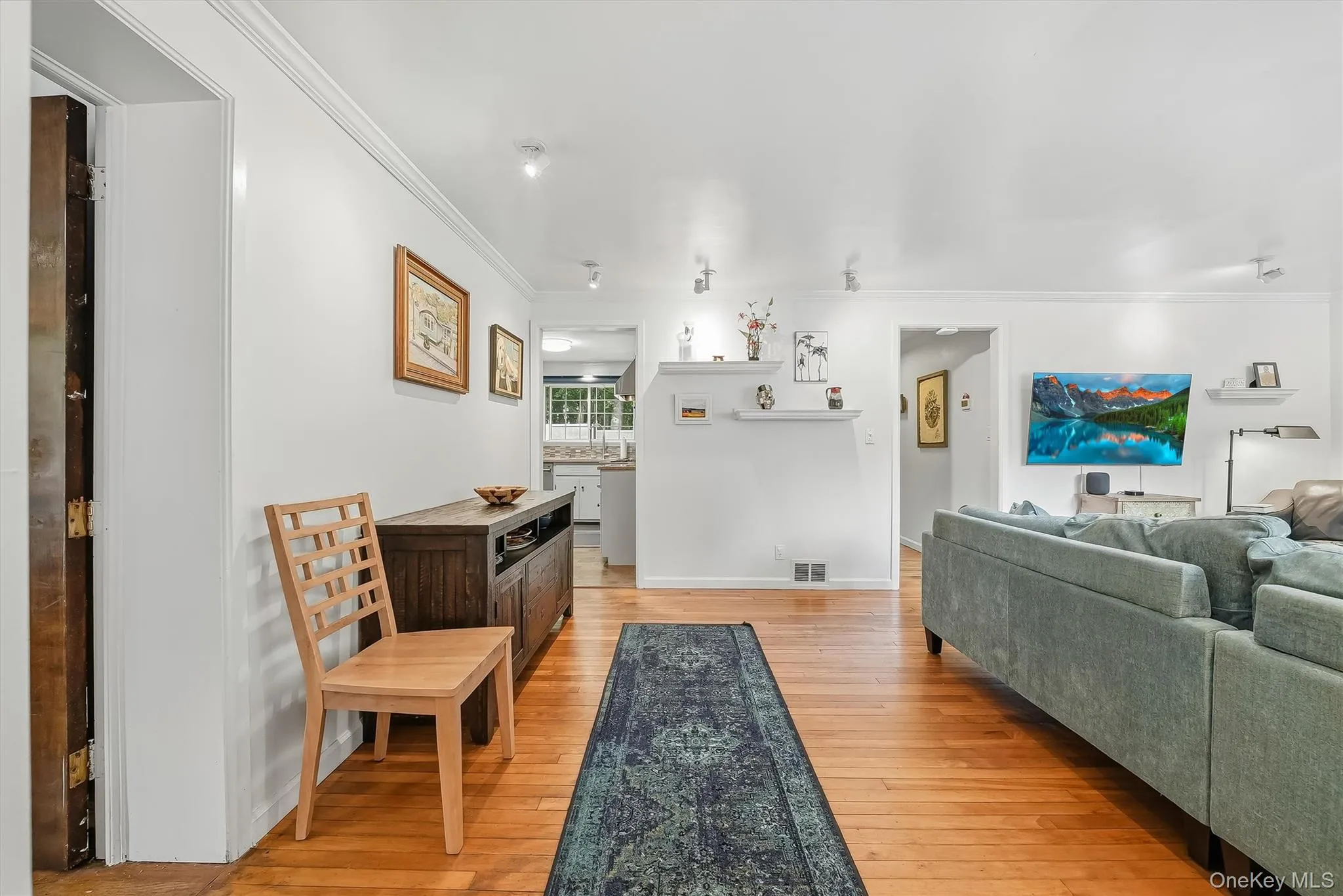 Enter into the sun filled living room. Enter into the sun filled living room.
