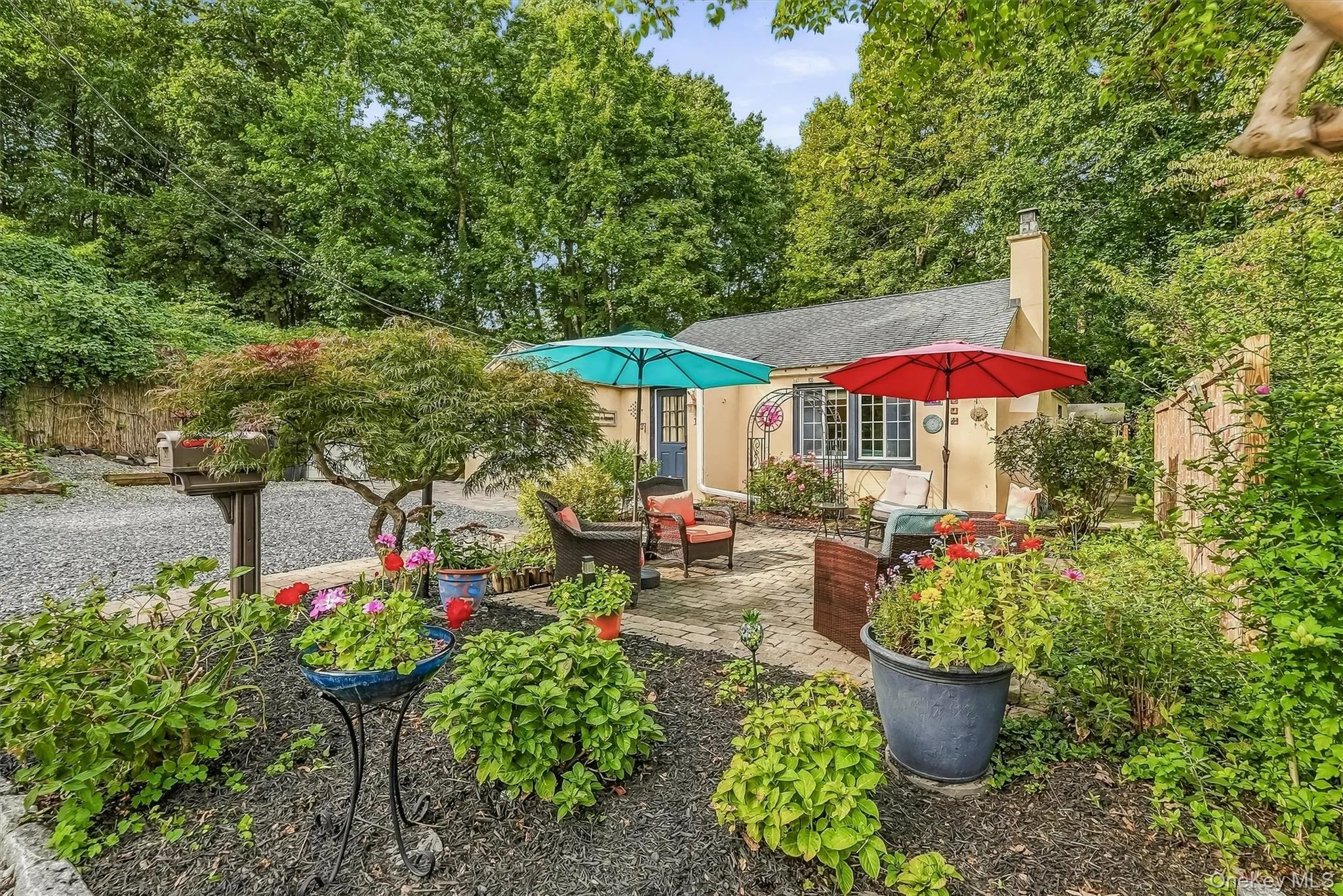 Incredible landscaping and gardens surround this charm filled home. Incredible landscaping and gardens surround this charm filled home.