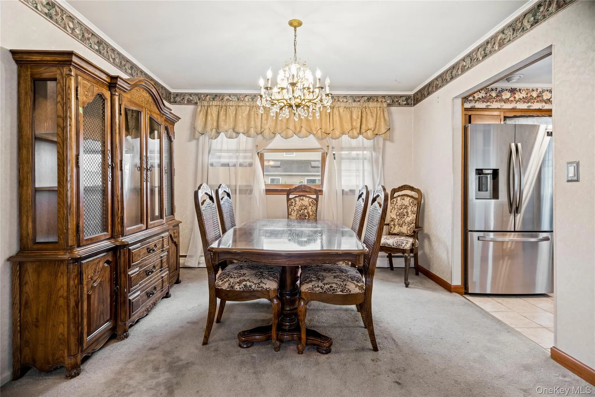 The formal dining room is spacious enough for a large dining table. The formal dining room is spacious enough for a large dining table.