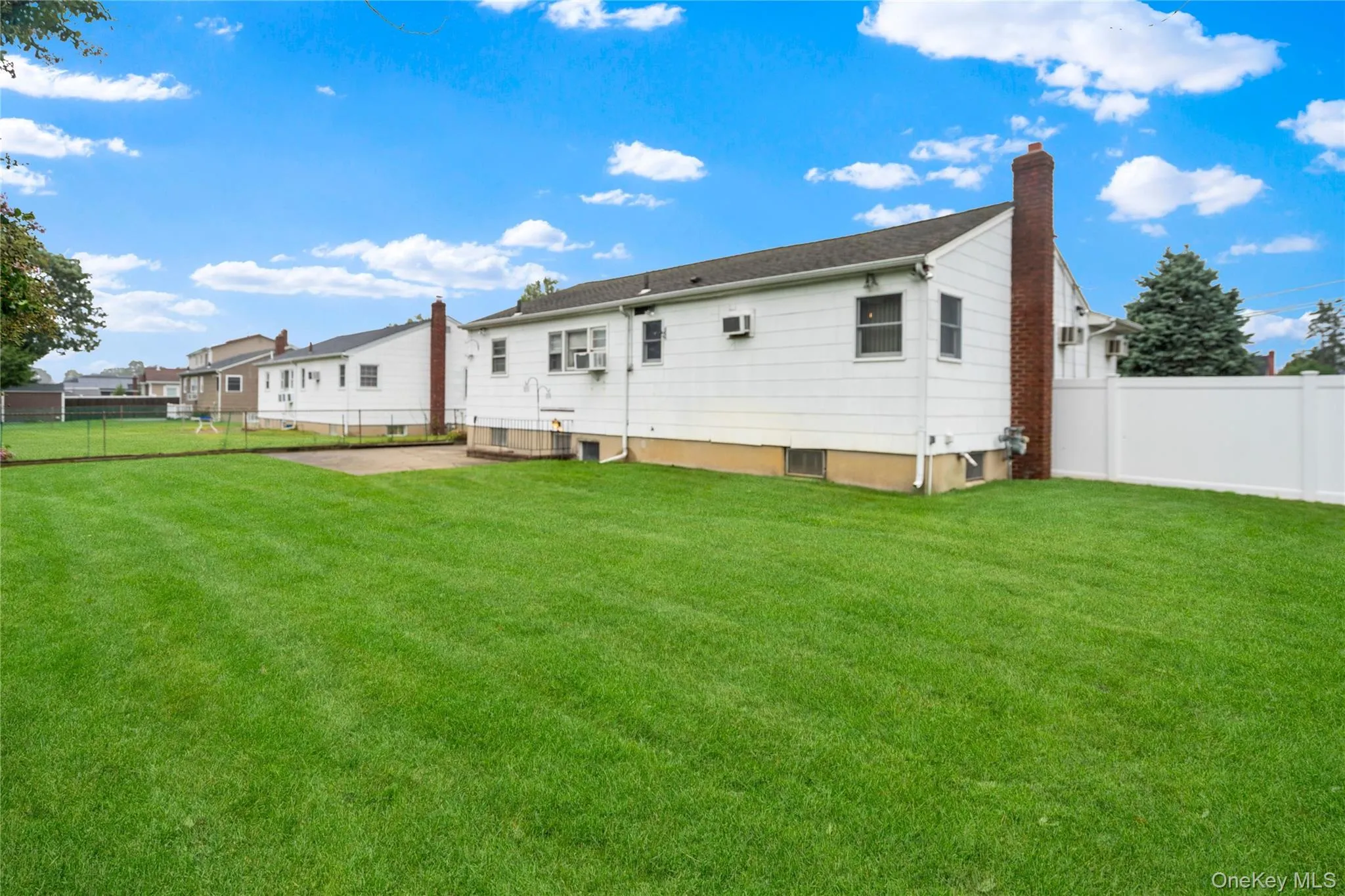 There is an architectural roof (approx. 20 yrs), the sides & rear of the home have builder's shingle siding... There is an architectural roof (approx. 20 yrs), the sides & rear of the home have builder's shingle siding...