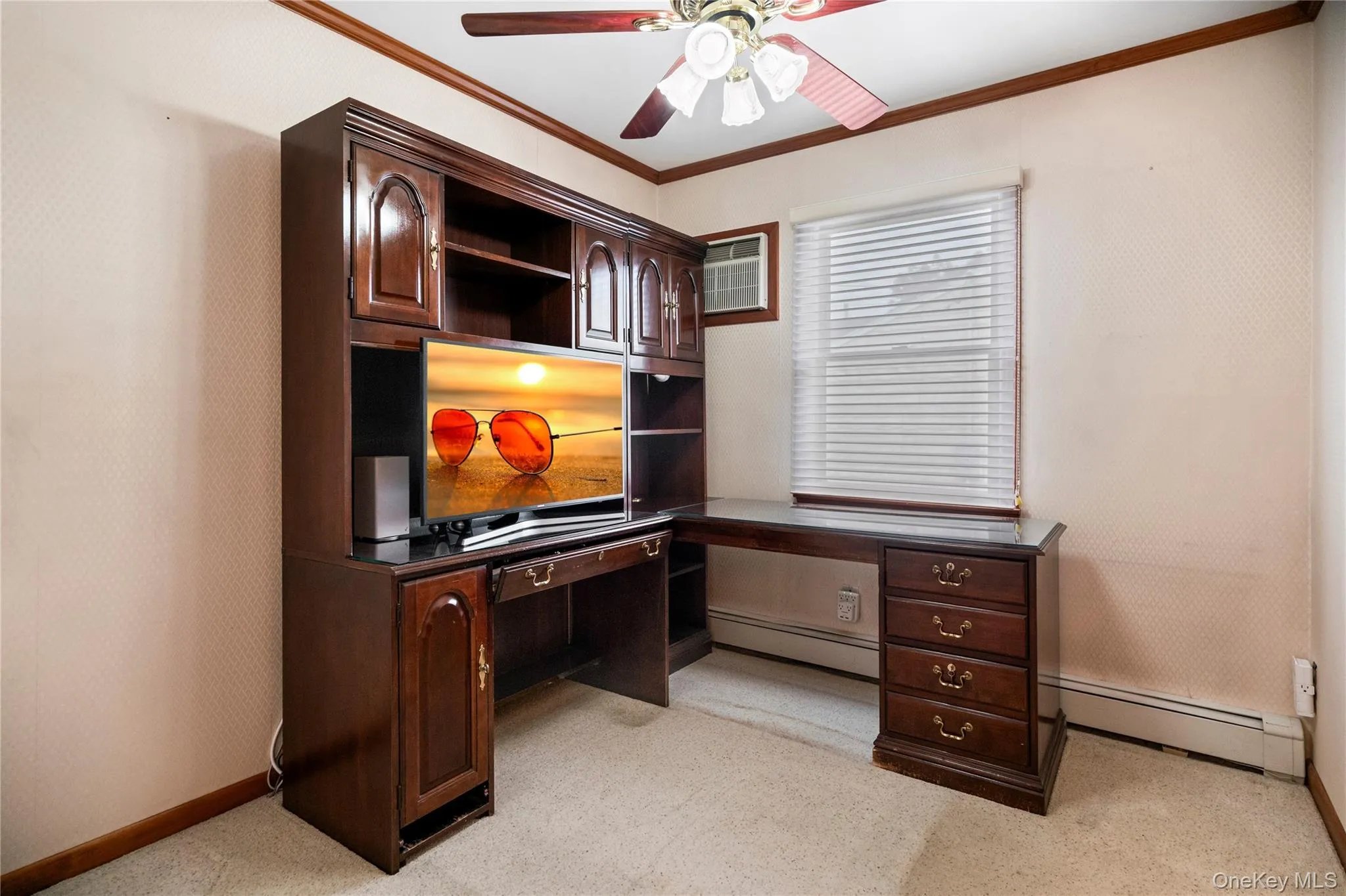 The 2nd bedroom is in the middle of the hallway and was used as the home office. The 2nd bedroom is in the middle of the hallway and was used as the home office.
