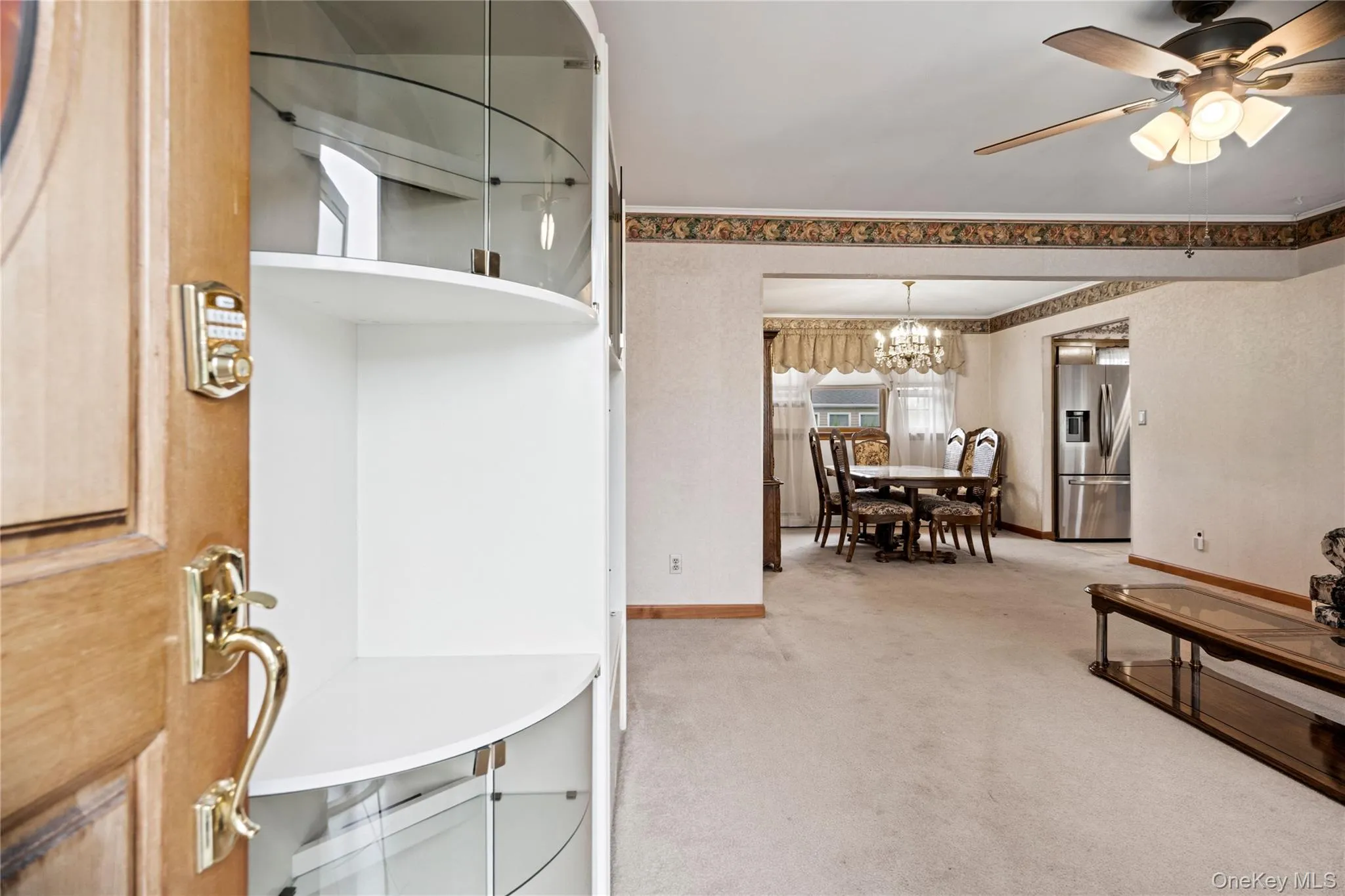 Walk in off the front porch and into the living room. Walk in off the front porch and into the living room.