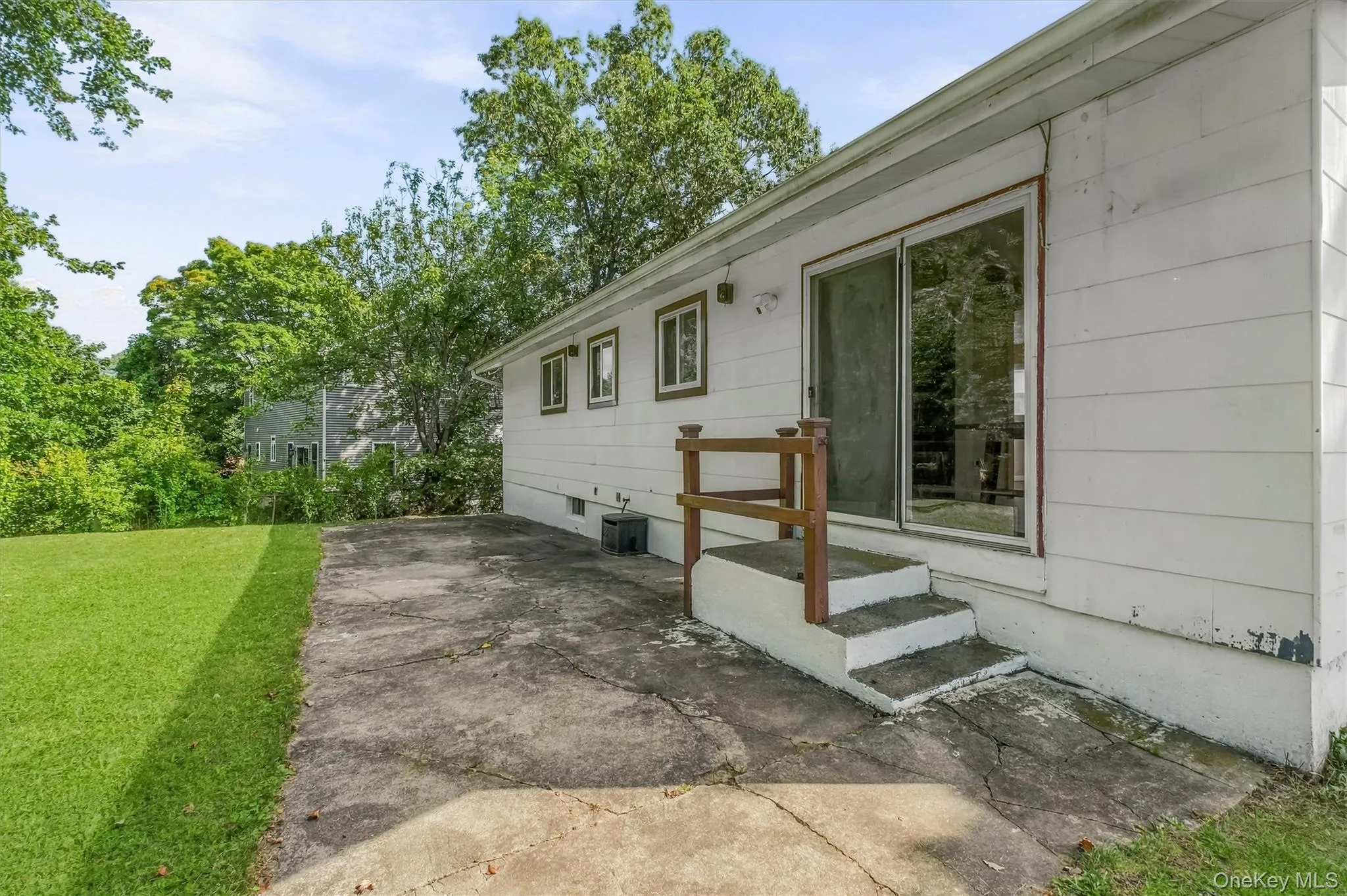 Patio in back of home accessed from dining room. Patio in back of home accessed from dining room.