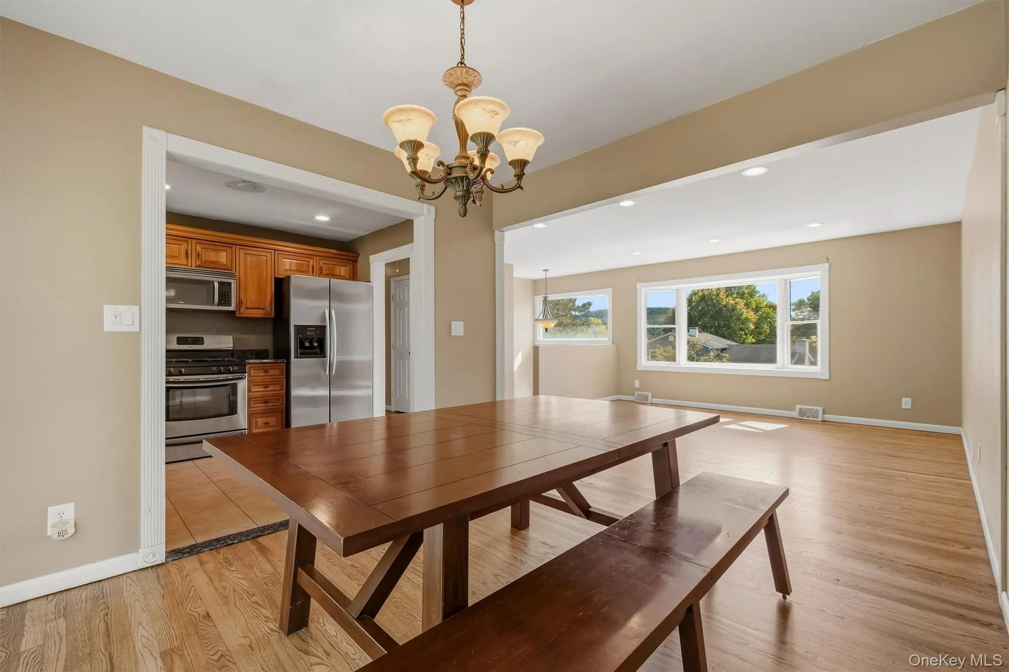 The formal dining room opens to the updated kitchen. The formal dining room opens to the updated kitchen.