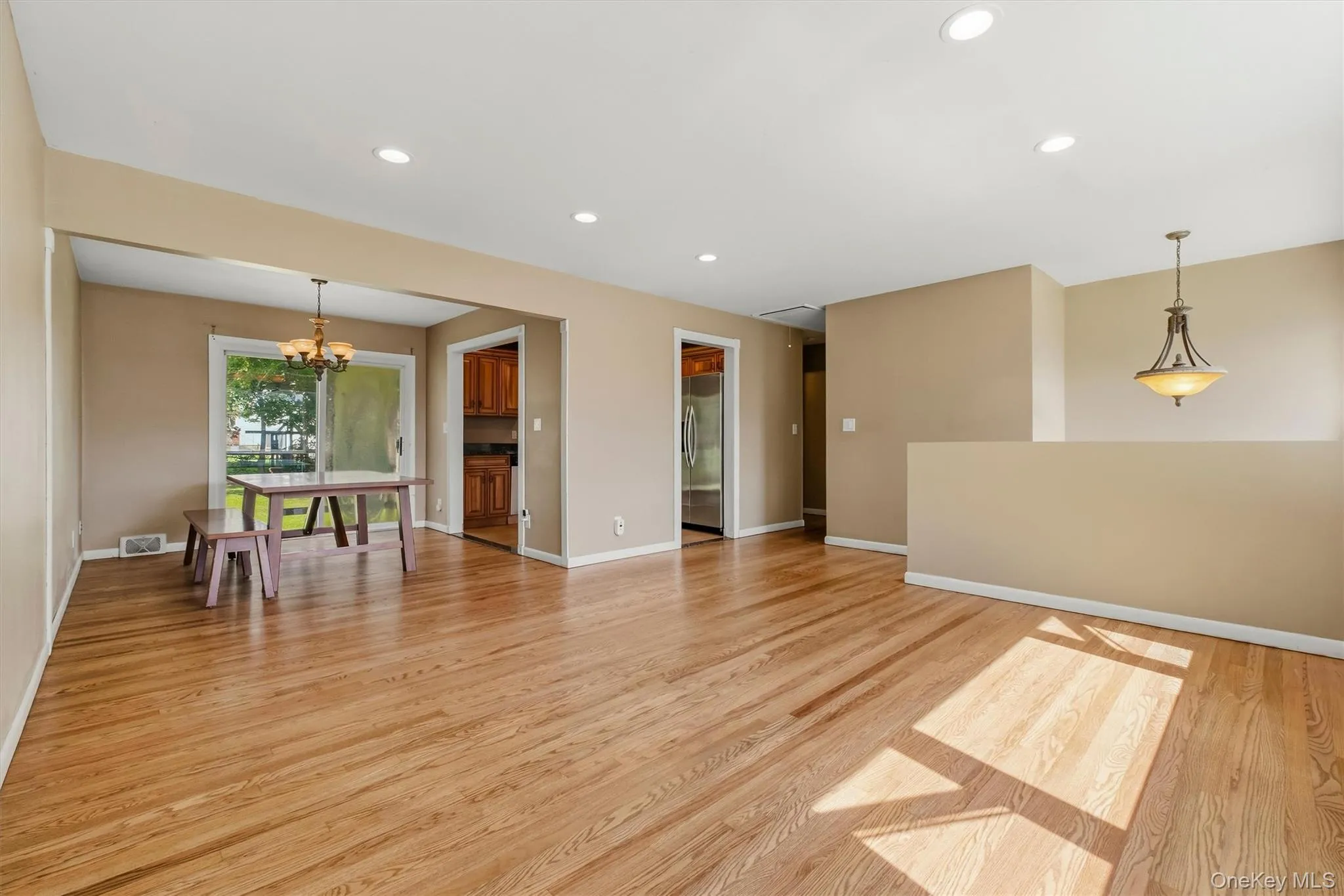 Living room to dining room. Living room to dining room.