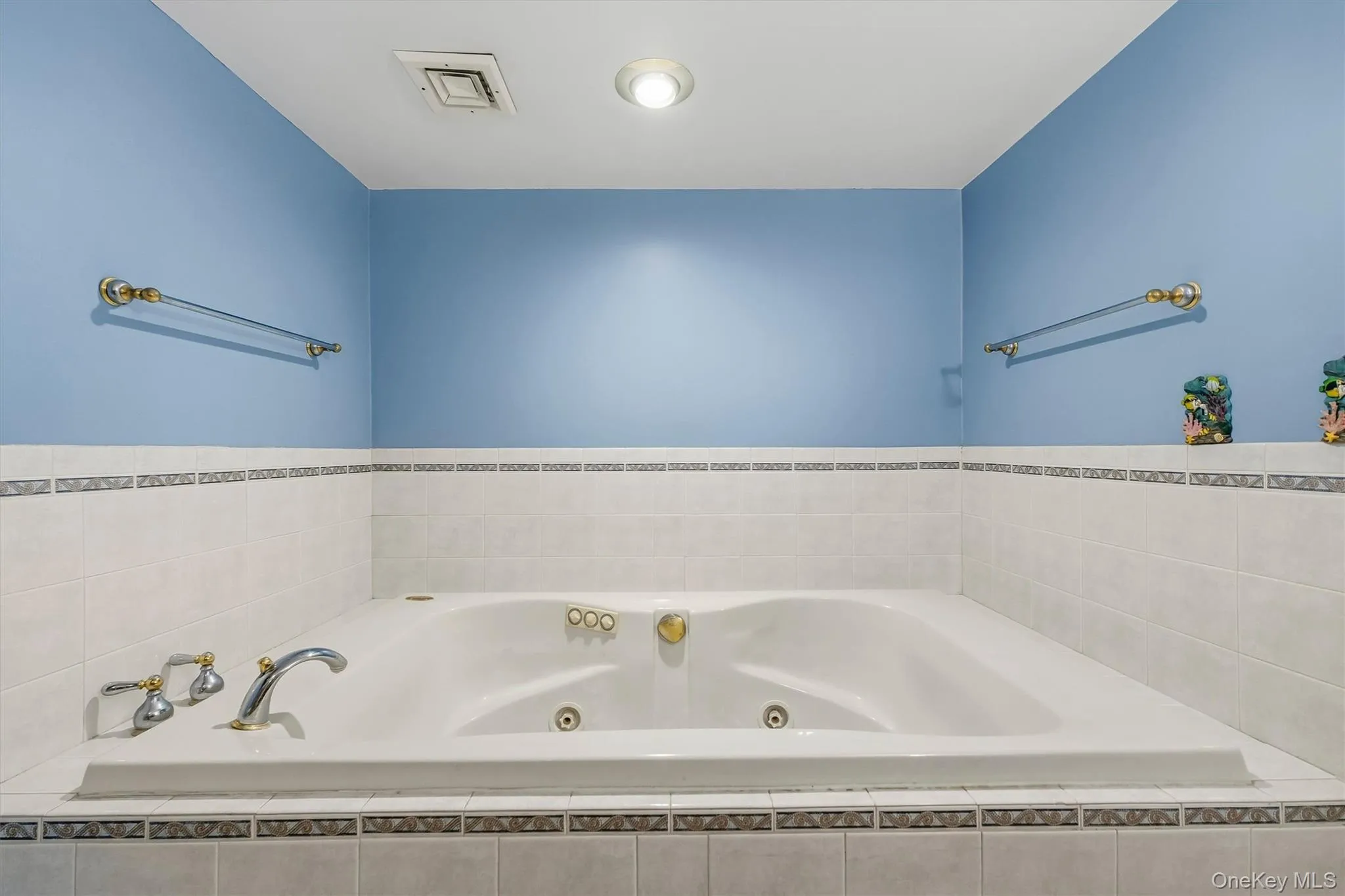 Large bathroom on lower lever with large tub. Large bathroom on lower lever with large tub.