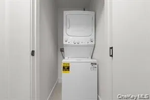 White stacked washer and dryer unit White stacked washer and dryer unit