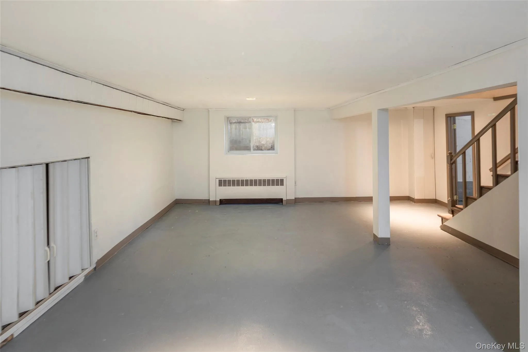 Has a painted concrete floor and sheetrock walls and ceiling Has a painted concrete floor and sheetrock walls and ceiling
