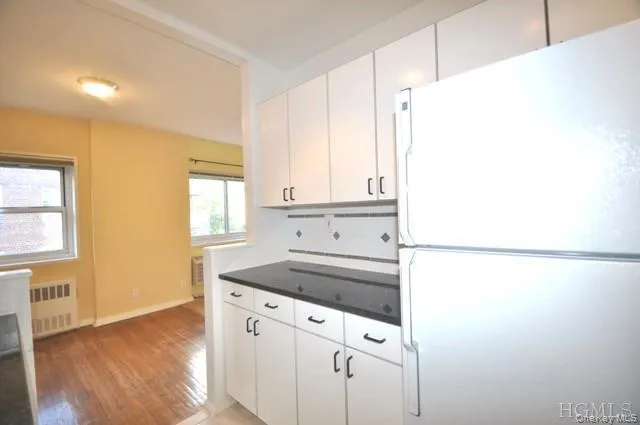 Updated Kitchen with Granite counters, Range, Dishwasher, Microwave and Refrigerator. Updated Kitchen with Granite counters, Range, Dishwasher, Microwave and Refrigerator.