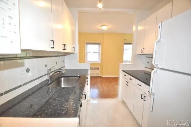 Updated Kitchen with Granite counters, Range, Dishwasher, Microwave and Refrigerator. Updated Kitchen with Granite counters, Range, Dishwasher, Microwave and Refrigerator.