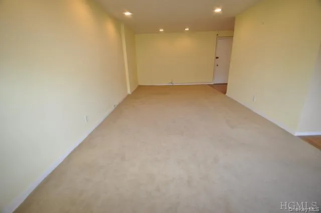 Bright and large "L" shaped Living Room and Dining Area. Bright and large "L" shaped Living Room and Dining Area.