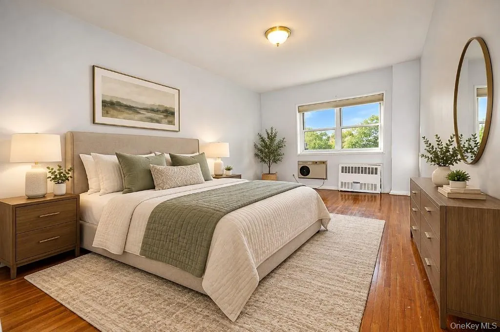 Visually Staged Photo..Large Bedroom with double floor to ceiling closets. Visually Staged Photo..Large Bedroom with double floor to ceiling closets.