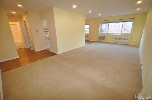 Bright and large "L" shaped Living Room and Dining Area. Bright and large "L" shaped Living Room and Dining Area.
